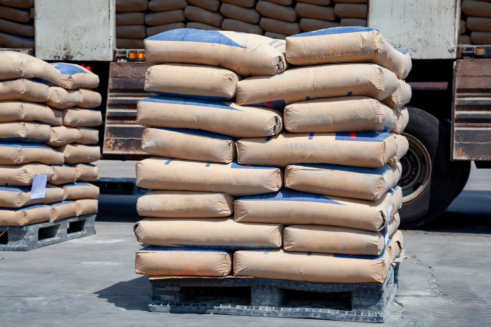 Bags of Cement Stacked on Pallets — Cessnock Landscaping Supplies In Cessnock, NSW