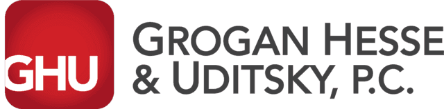 A logo for grogan hesse and uditsky p.c.