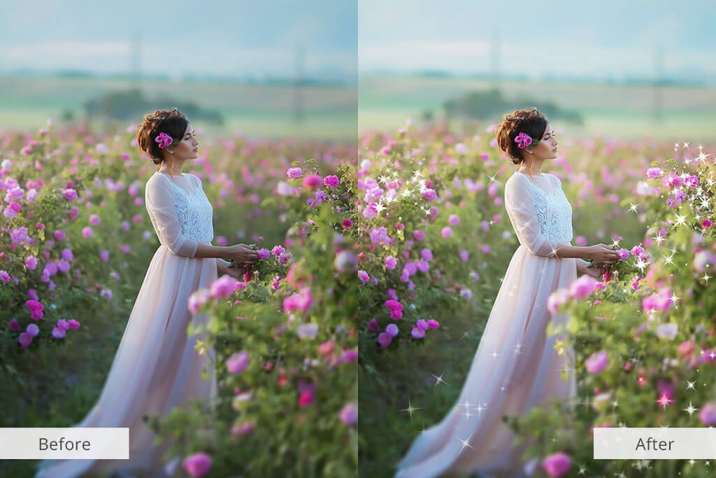 A woman in a white dress is standing in a field of pink flowers.