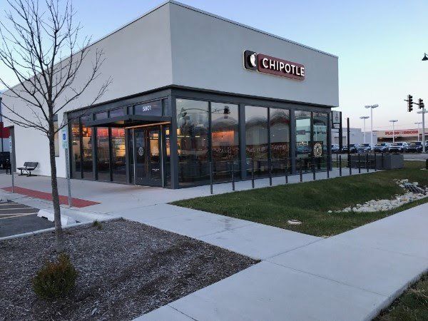 A chipotle restaurant with a lot of windows