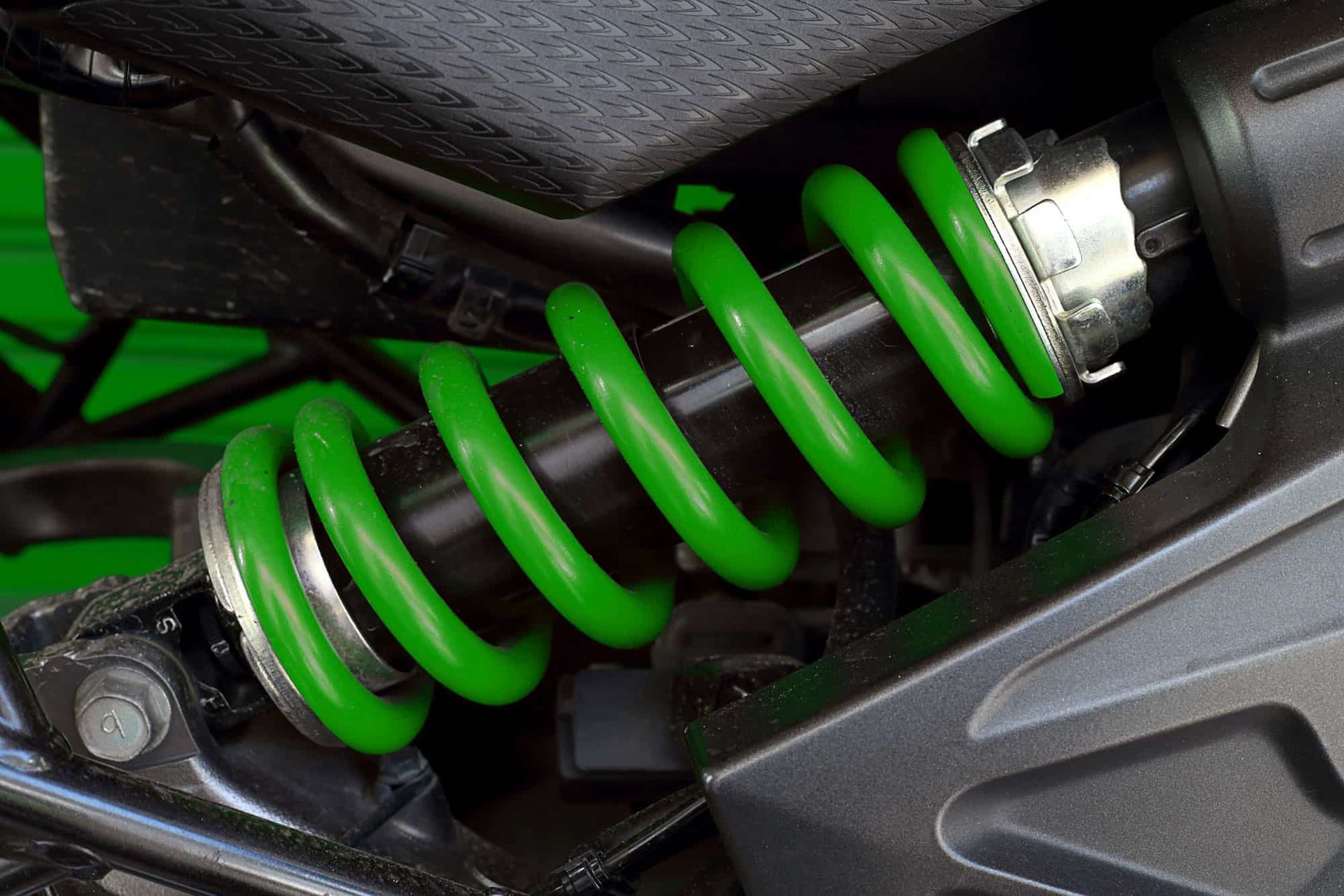 A Close Up of a Green Spring on a Motorcycle — Ultra Tune Nambour In Nambour, QLD