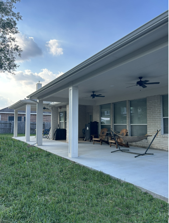 The inside of a building under construction with a wooden roof.