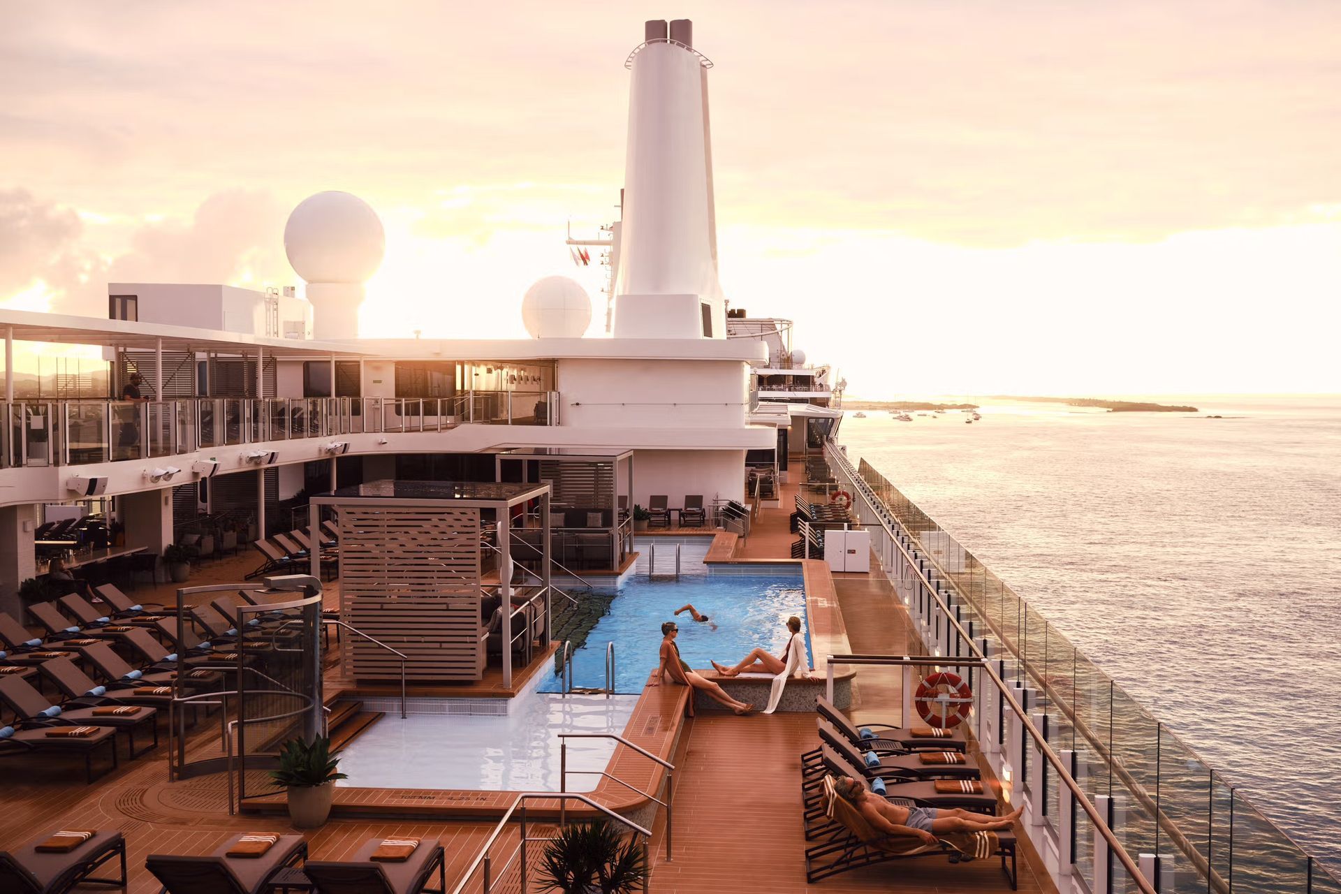 Silversea's Silver Ray cruise ship with a swimming pool on the deck