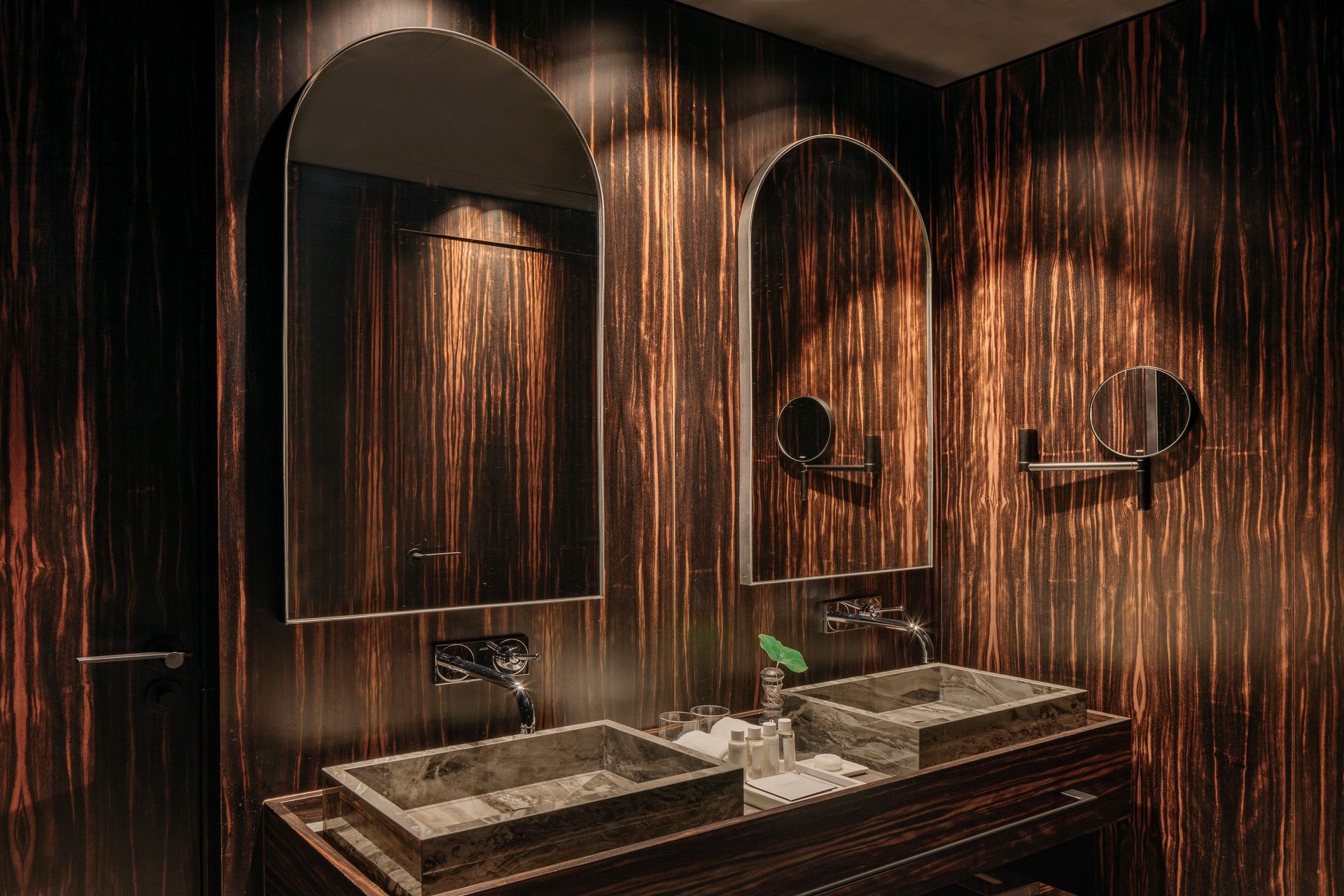 A bathroom with two sinks and two mirrors at Hotel Bagués in Barcelona, Spain.