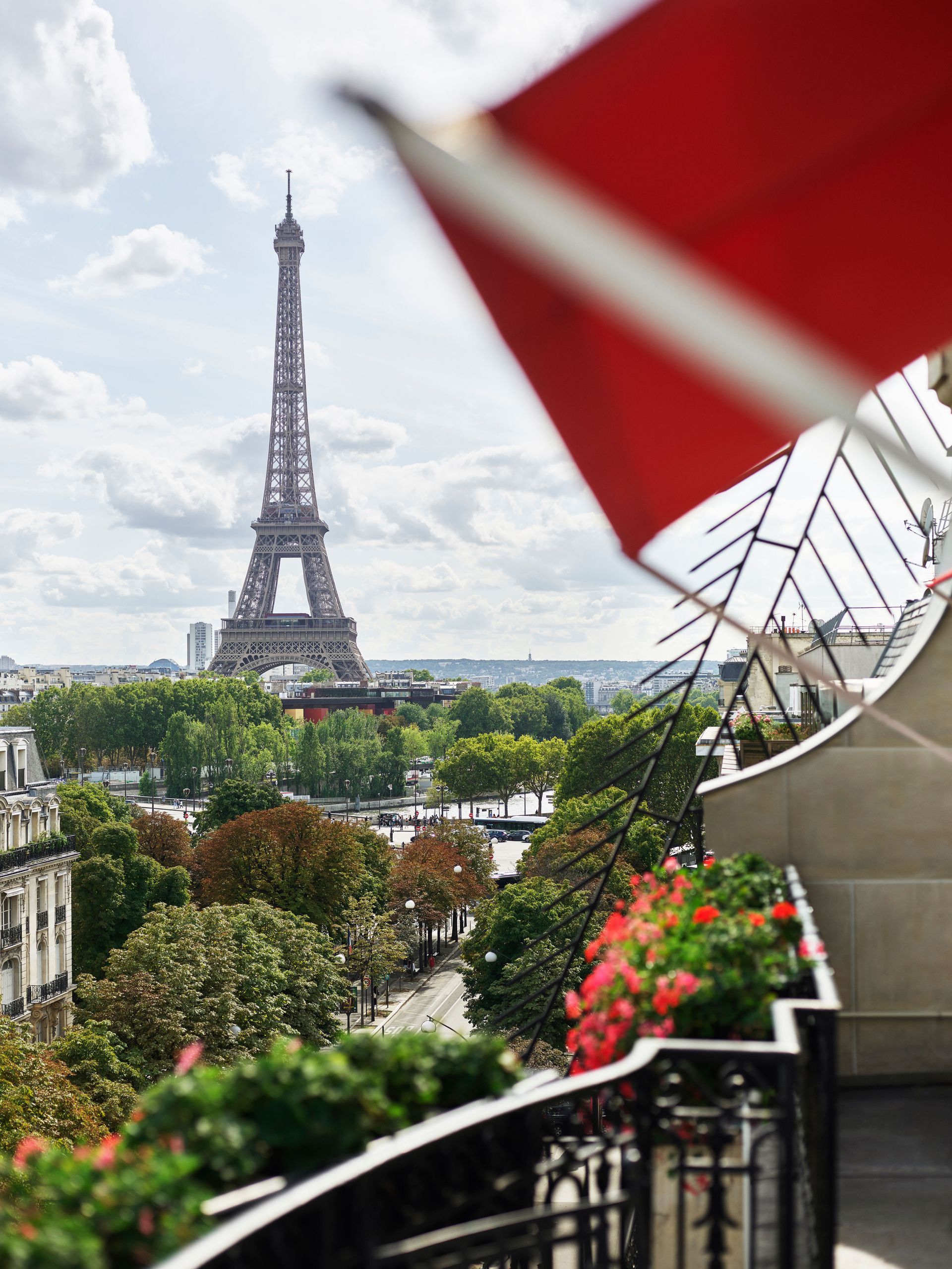 A balcony with a view of the eiffel tower in pairs at the Dorchester Collection hotel. 