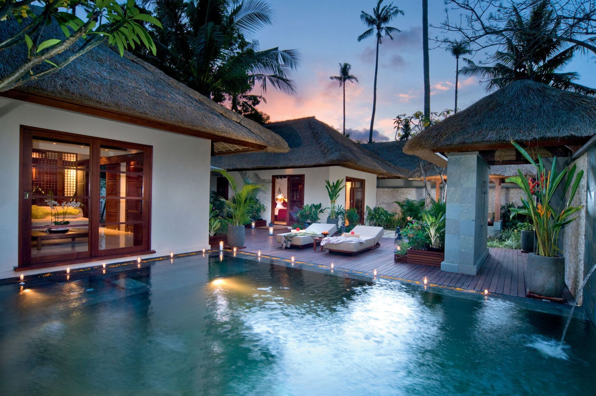 A villa with a swimming pool in front in Bali.