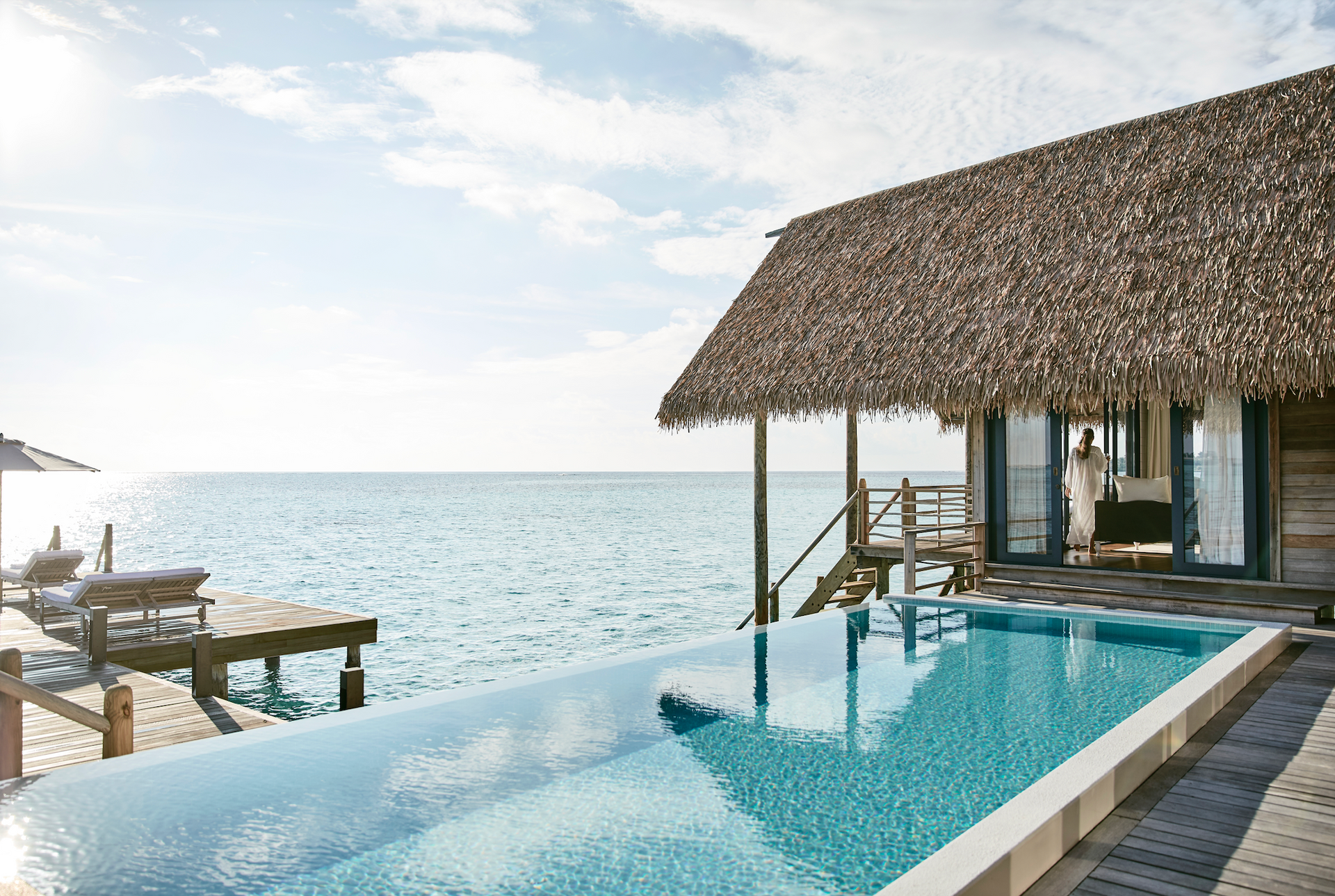 There is a swimming pool in an overwater bungalow at Como Resort in the Maldives. 