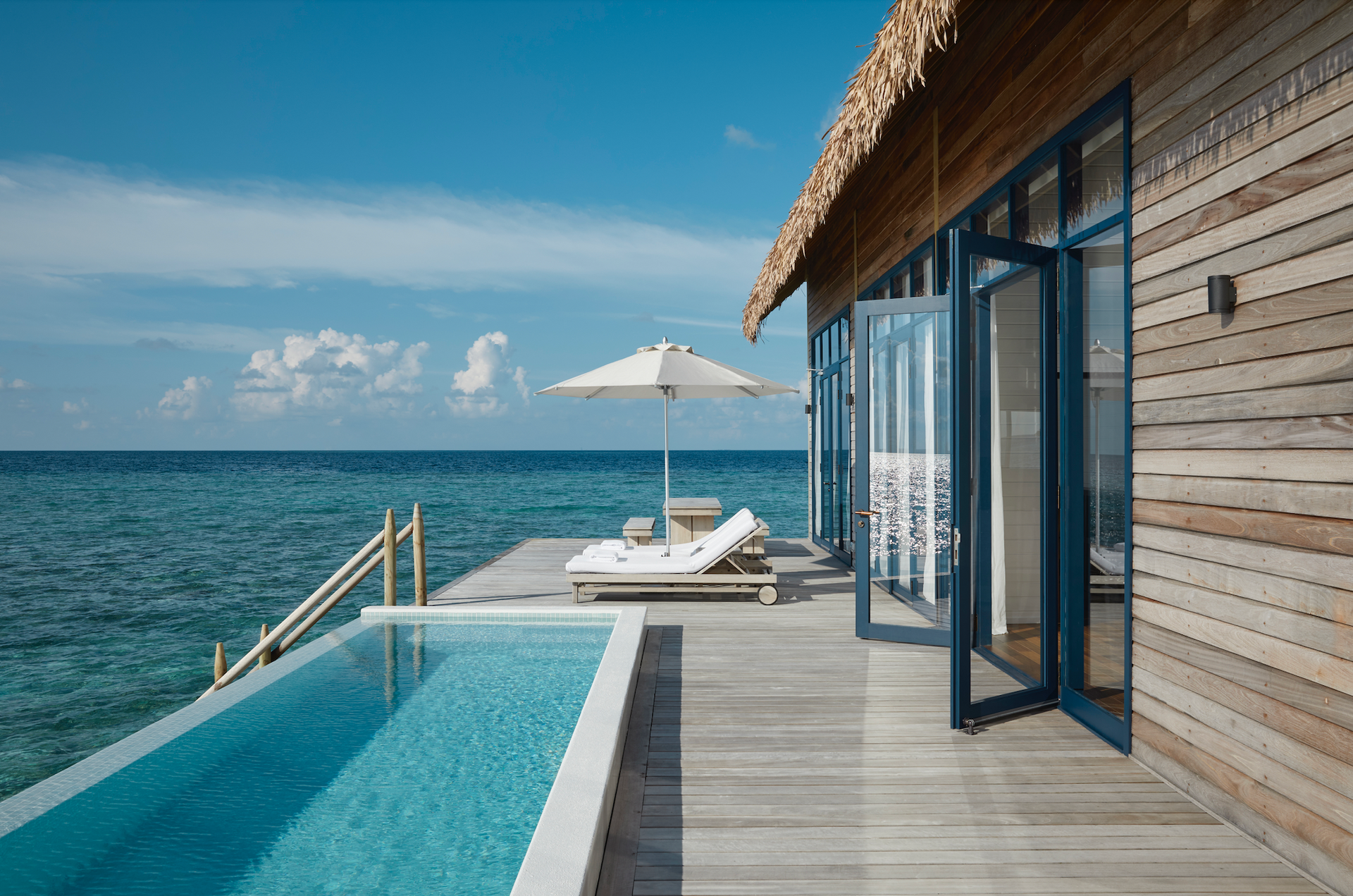 There is a swimming pool in an overwater bungalow at Como Resort in the Maldives. 