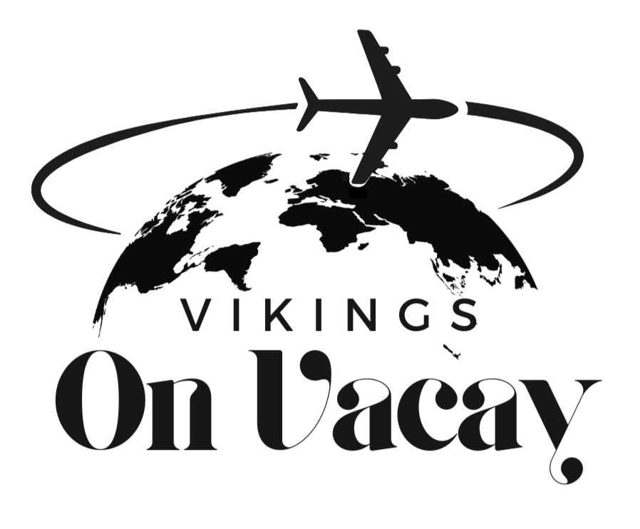 A black and white logo for viking on vacay