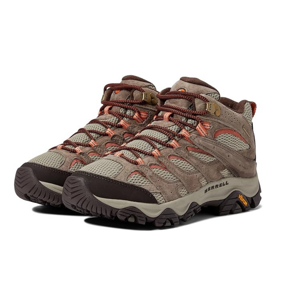 A pair of black teva sandals on a white background