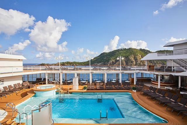 There is a large swimming pool on the deck of Silversea's Silver Whisper cruise ship.