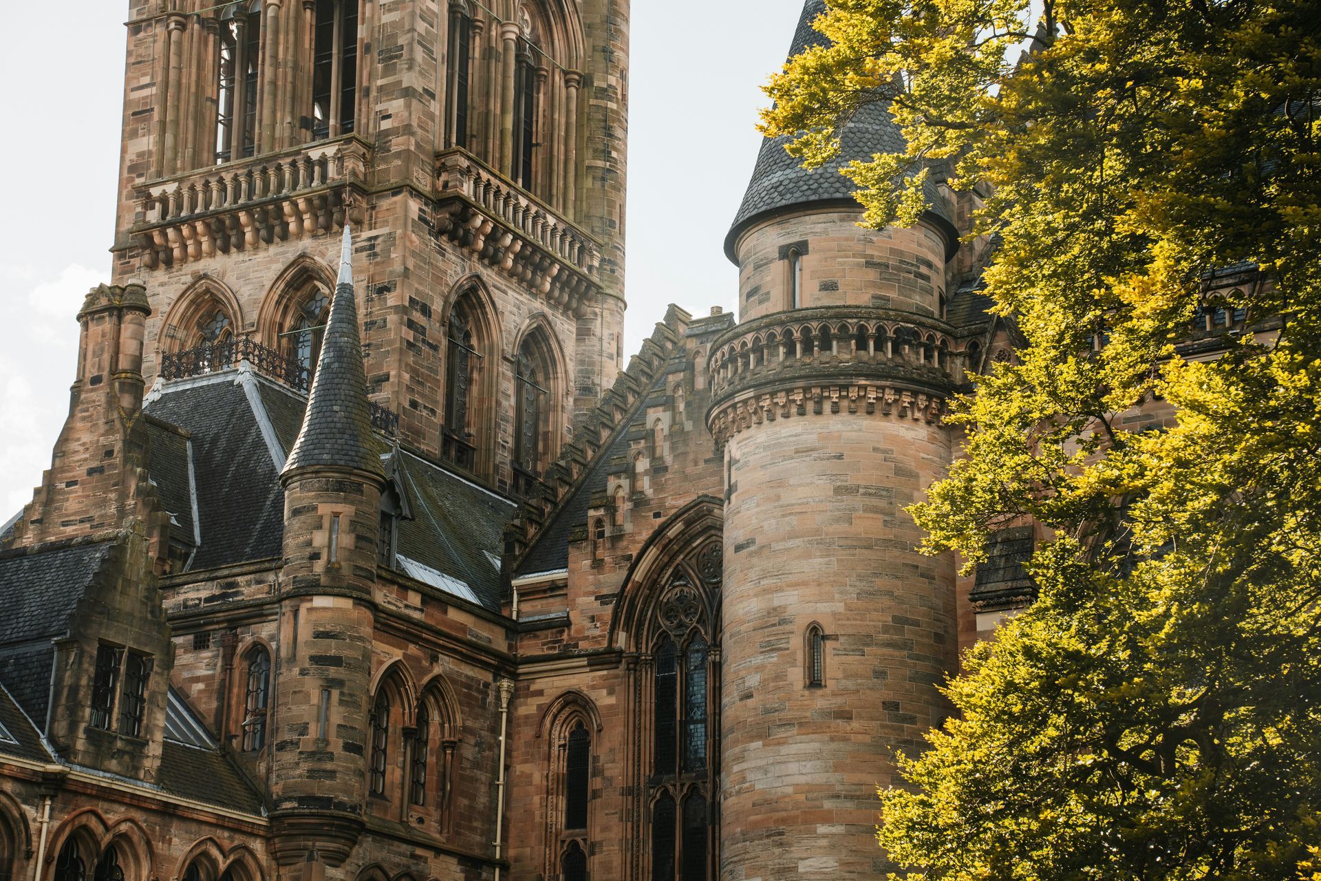 Gothic stone building with intricate architecture at the University of Glasgow in Scotland. 