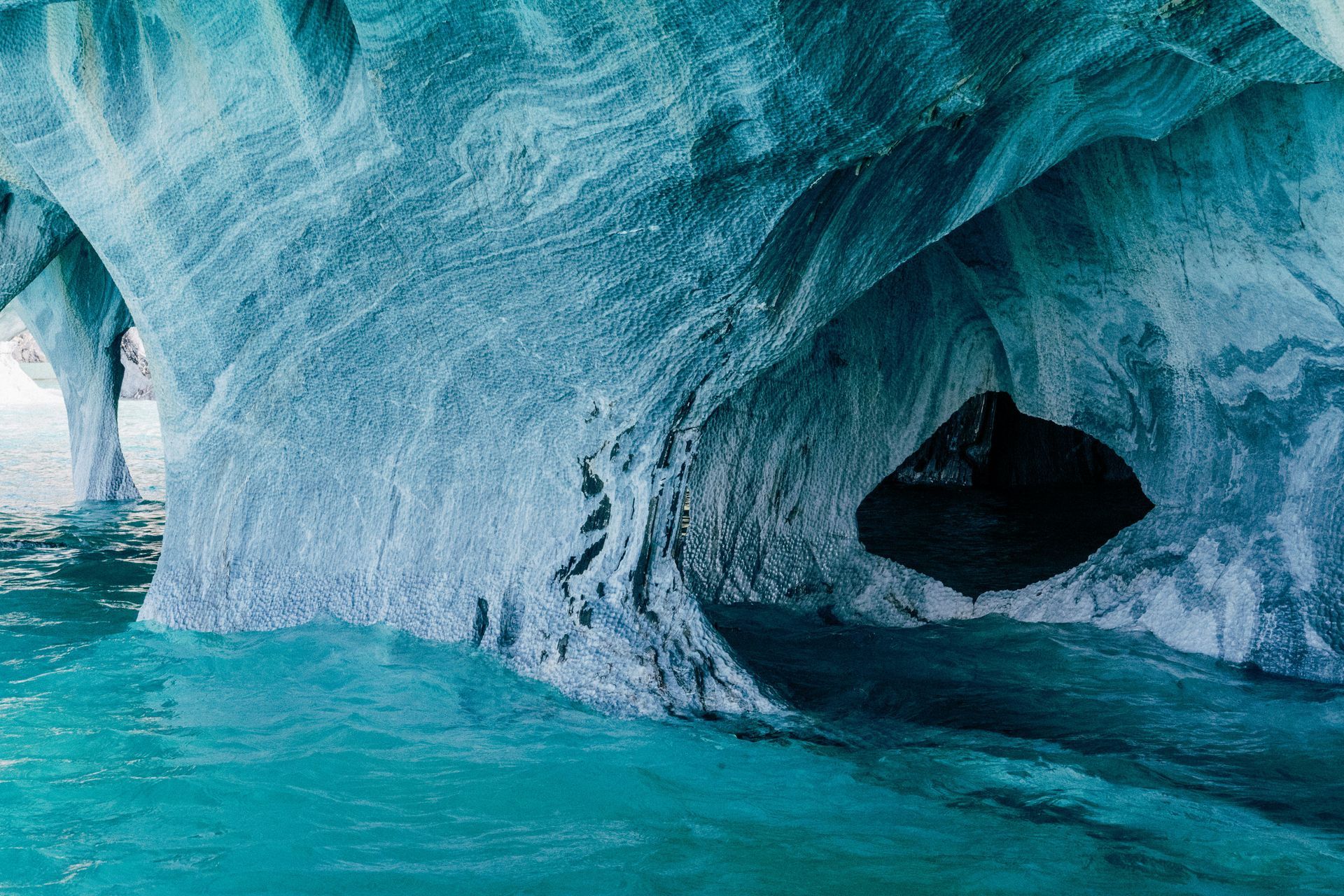 Blue marble caves with turquoise water in Aysén, Chile.