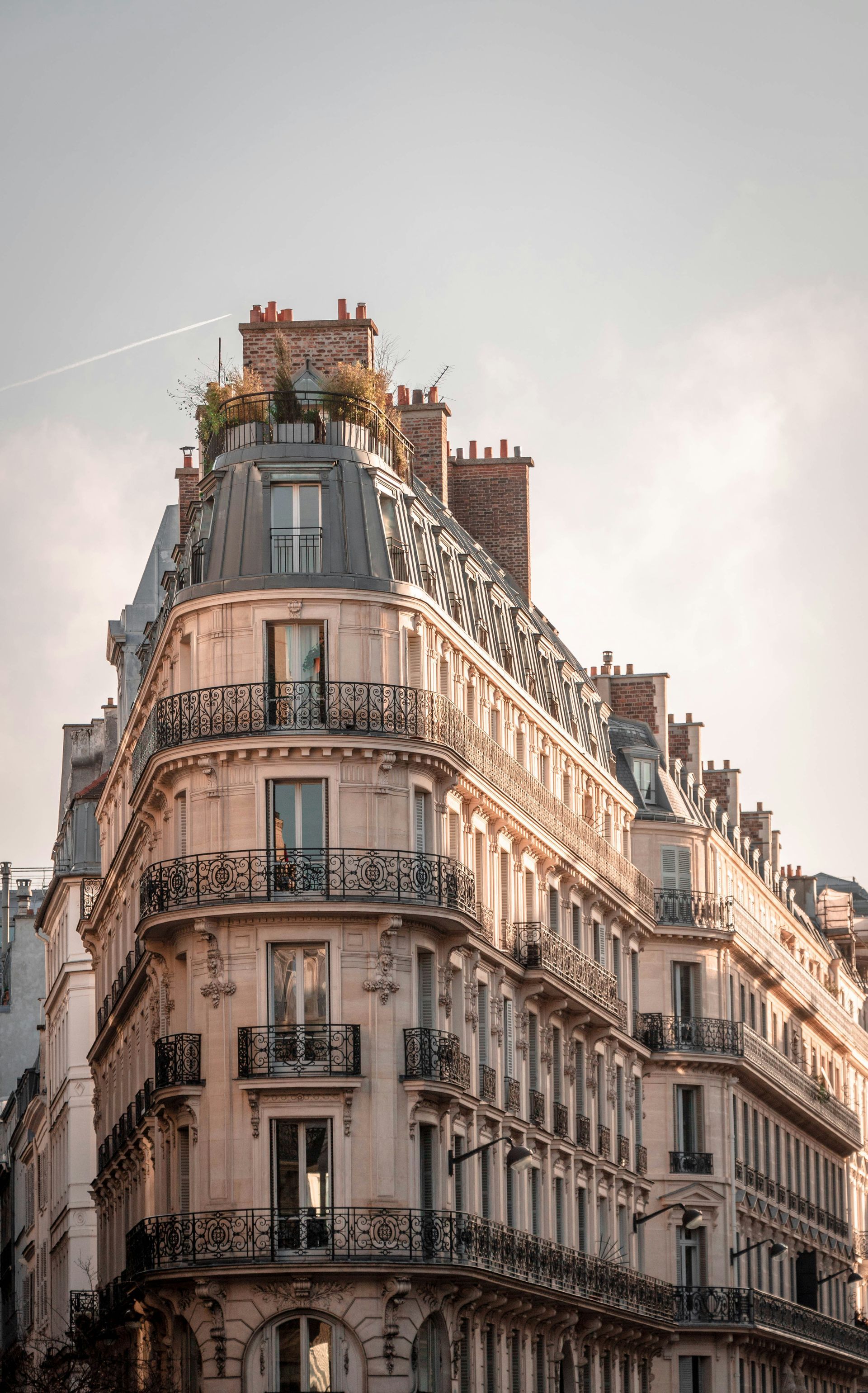 A large building with a lot of windows and balconies in paris in Paris, France.