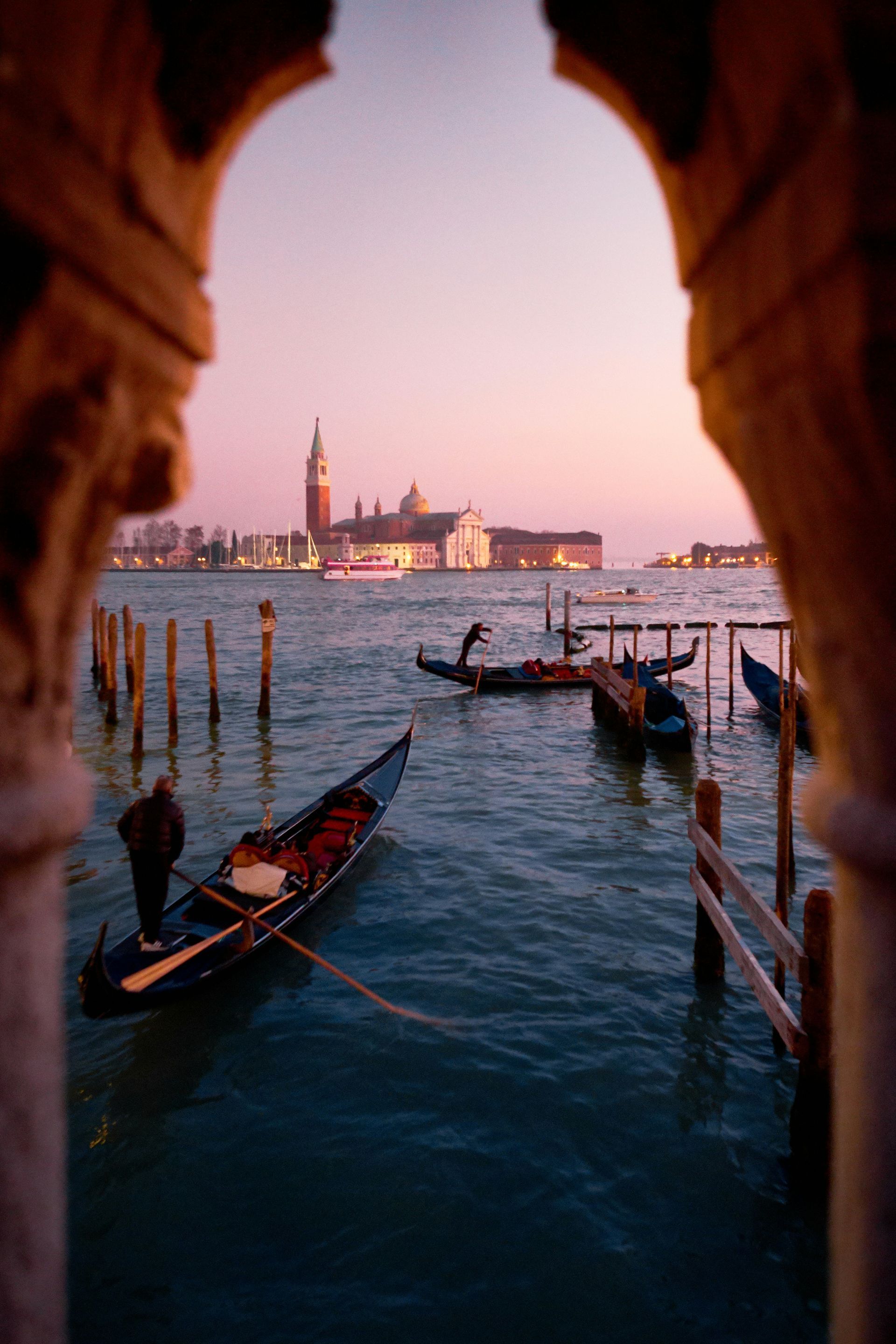 A view of a body of water with boats in it in Venice.
