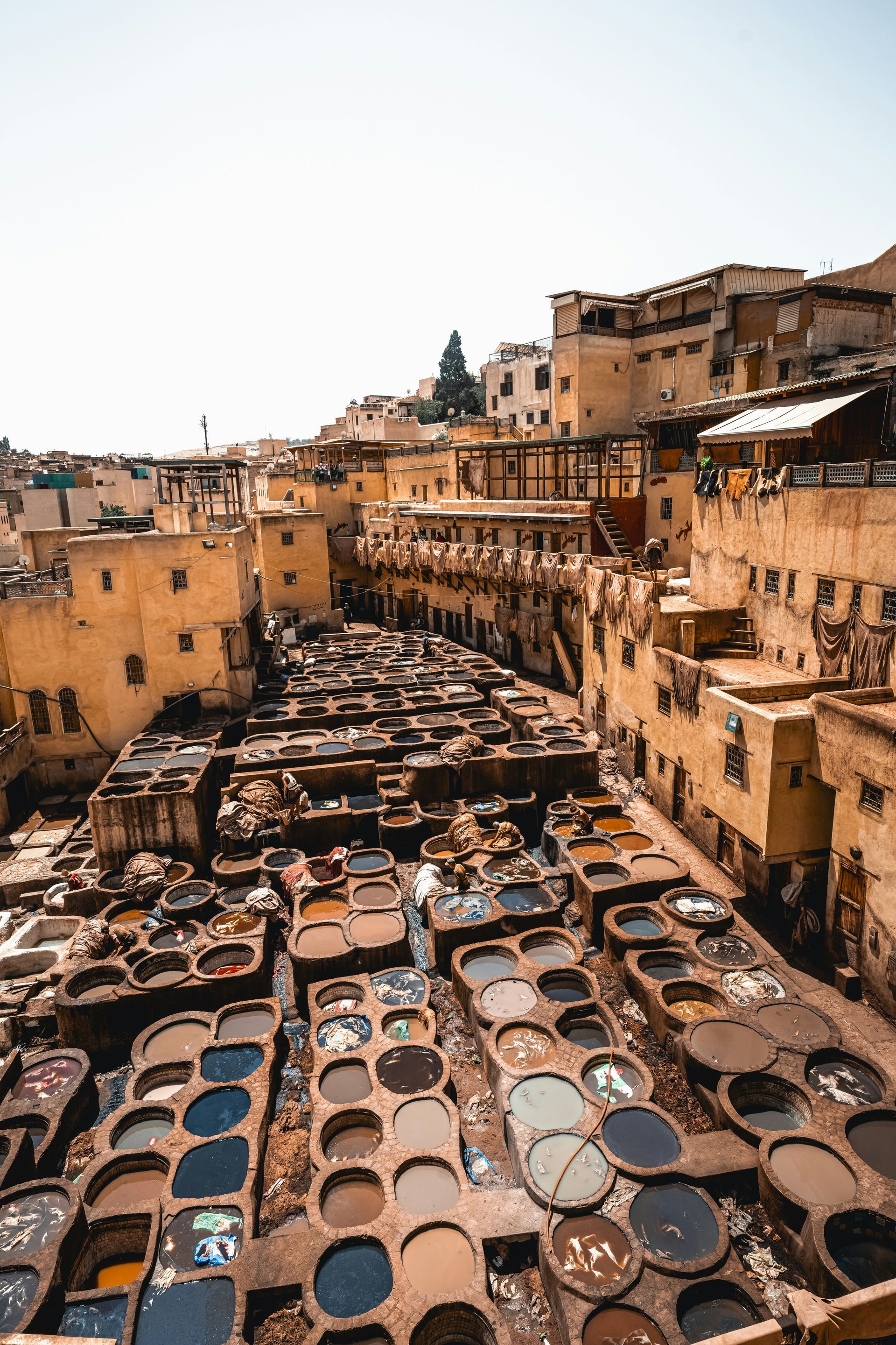 An aerial view of a Tannery filled with small pools of liquids in Fes, Morocco.