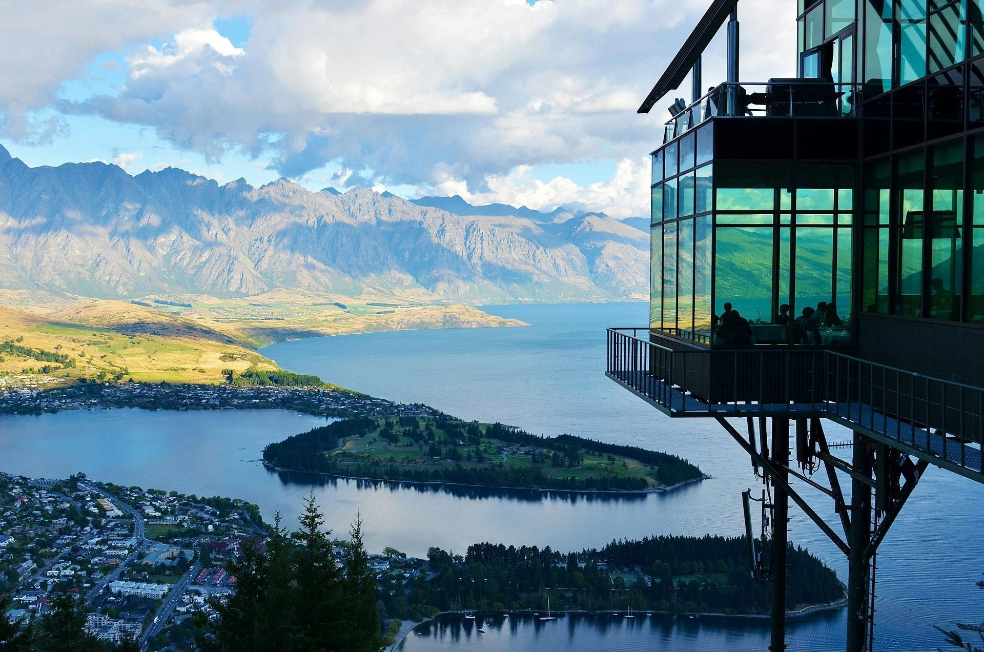 A view of a lake with mountains in the background in New Zeland.