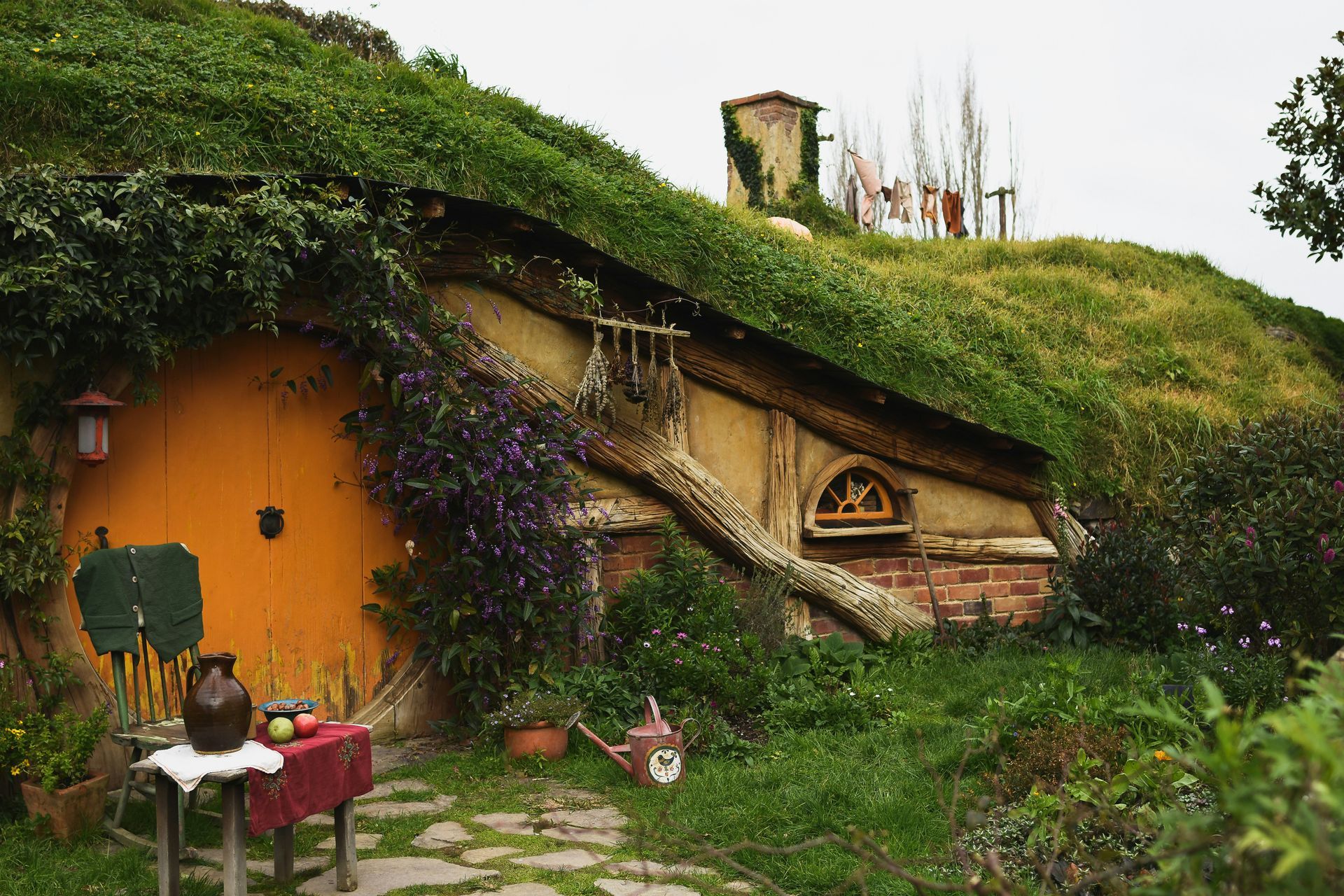 A hobbit house covered in grass at the Hobbiton Movie Set in Matamata, New Zealand.