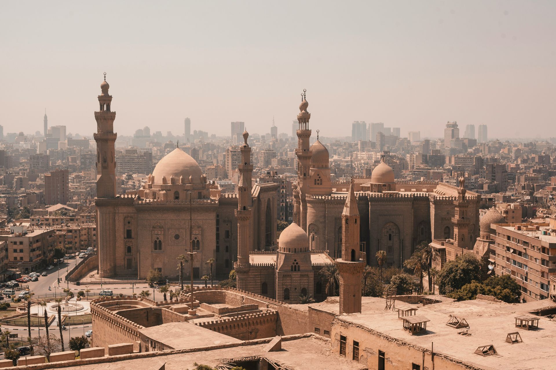 An aerial view of Cairo, Egypt with a mosque in the foreground