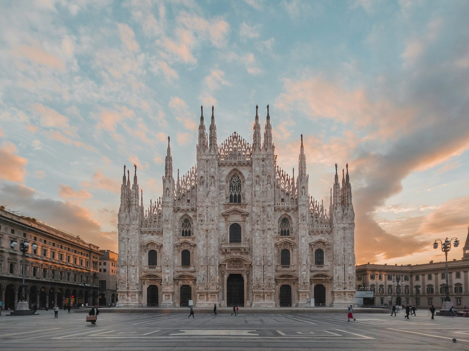 The Duomo di Milano with a cloudy sky in the background in Milan.