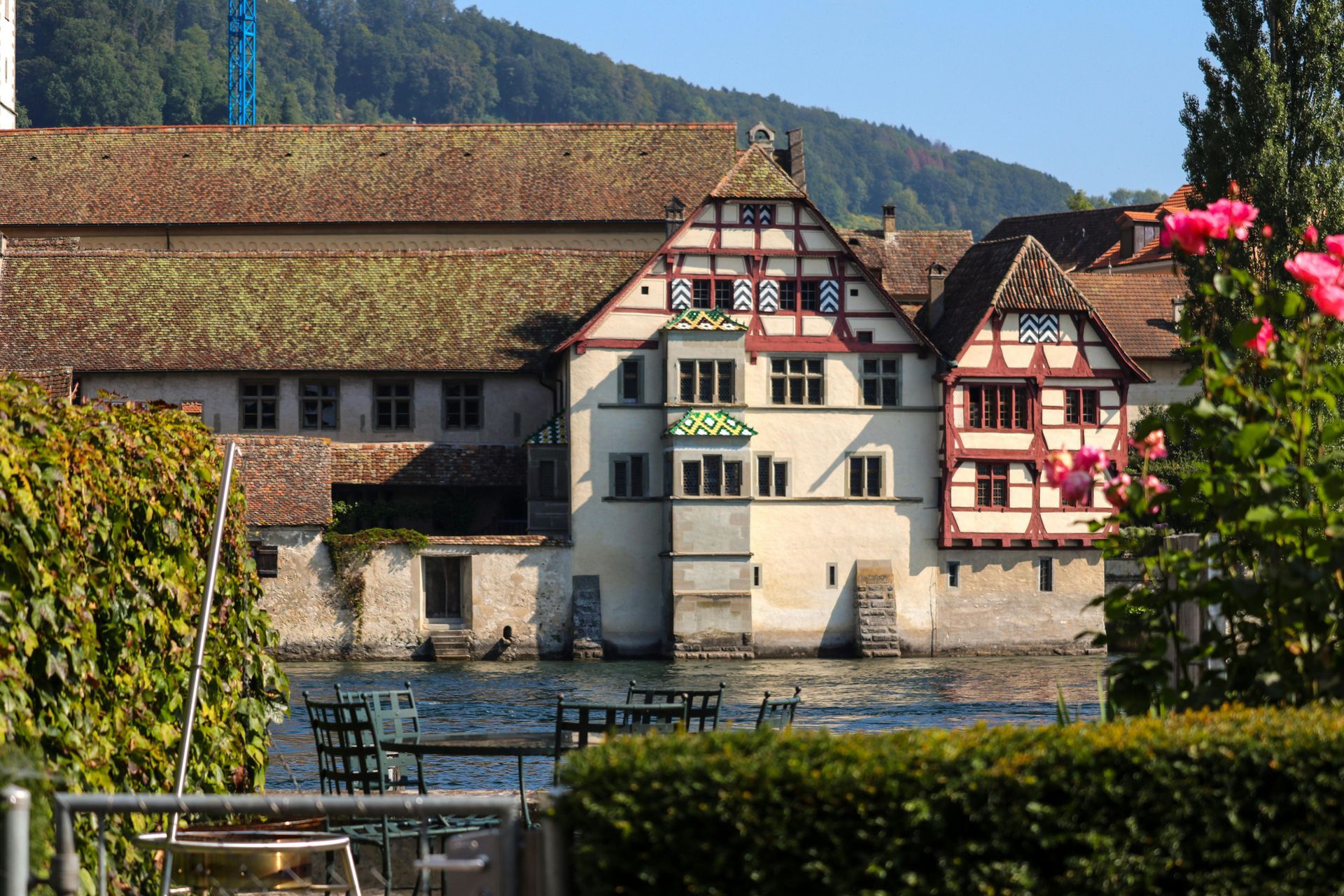 A building with a green sign that says ' abc ' on it in Switzerland.