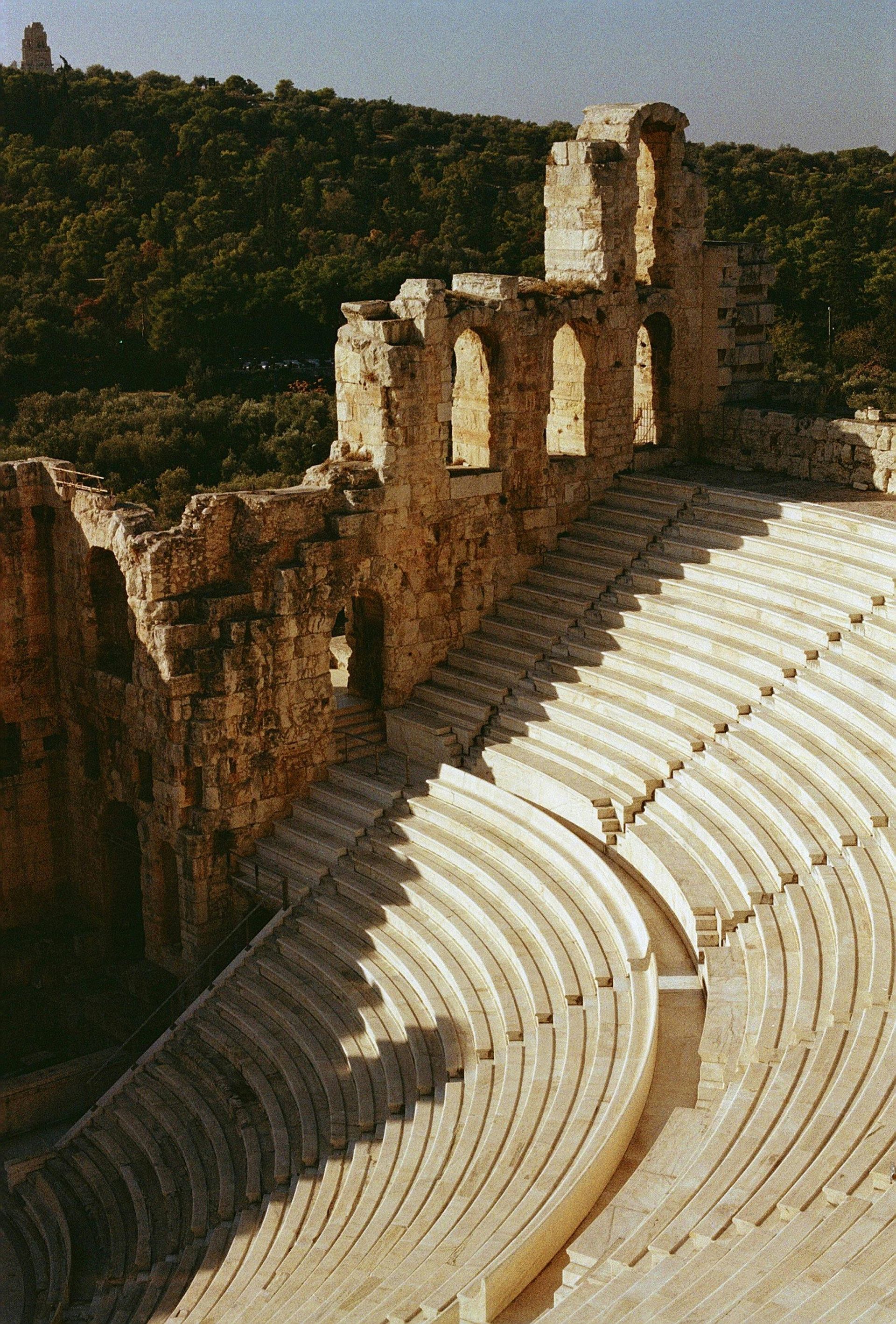 A very old amphitheater with a lot of seats in Athens, Greece.