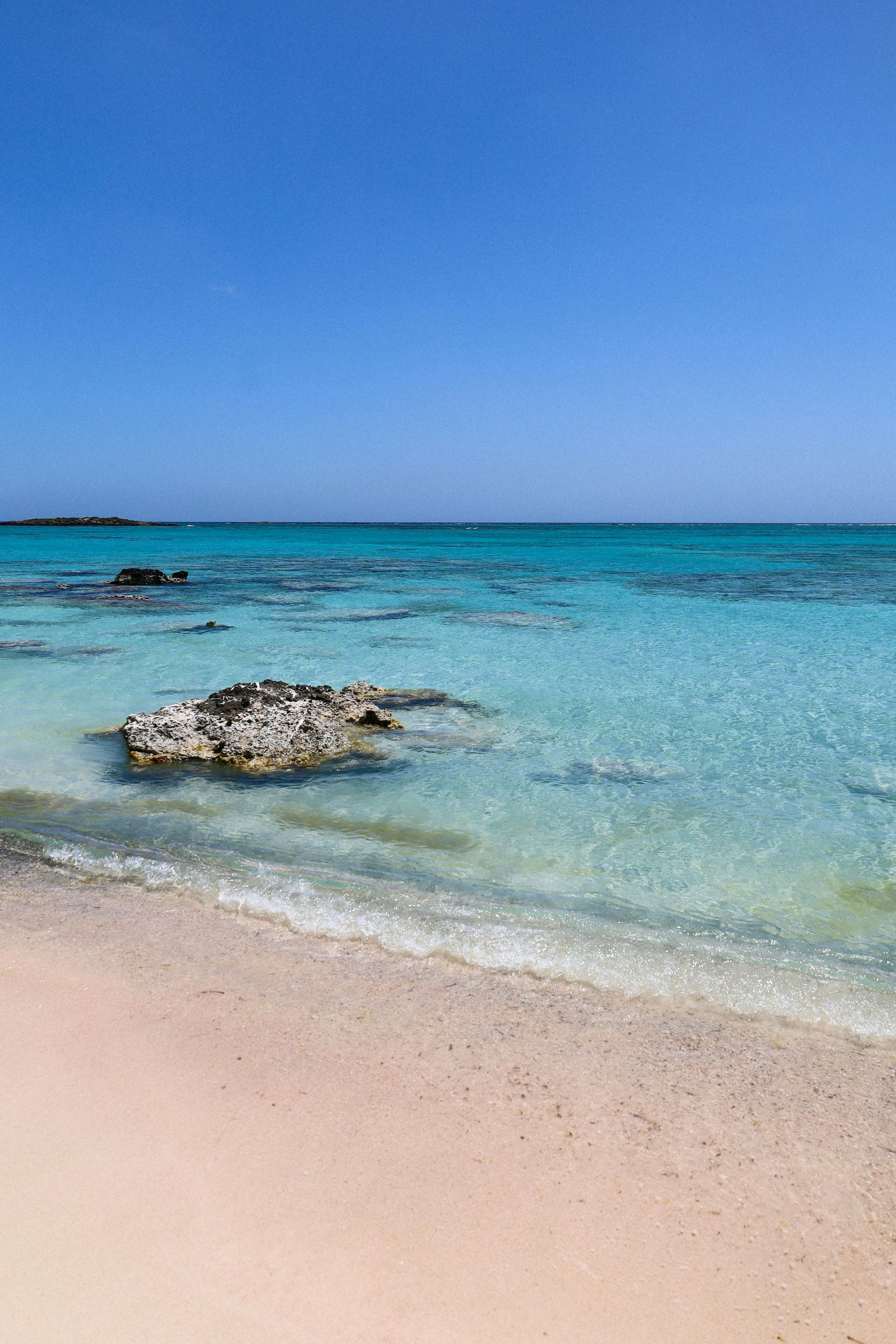 There is a large rock in the middle of in Crete, Greece.