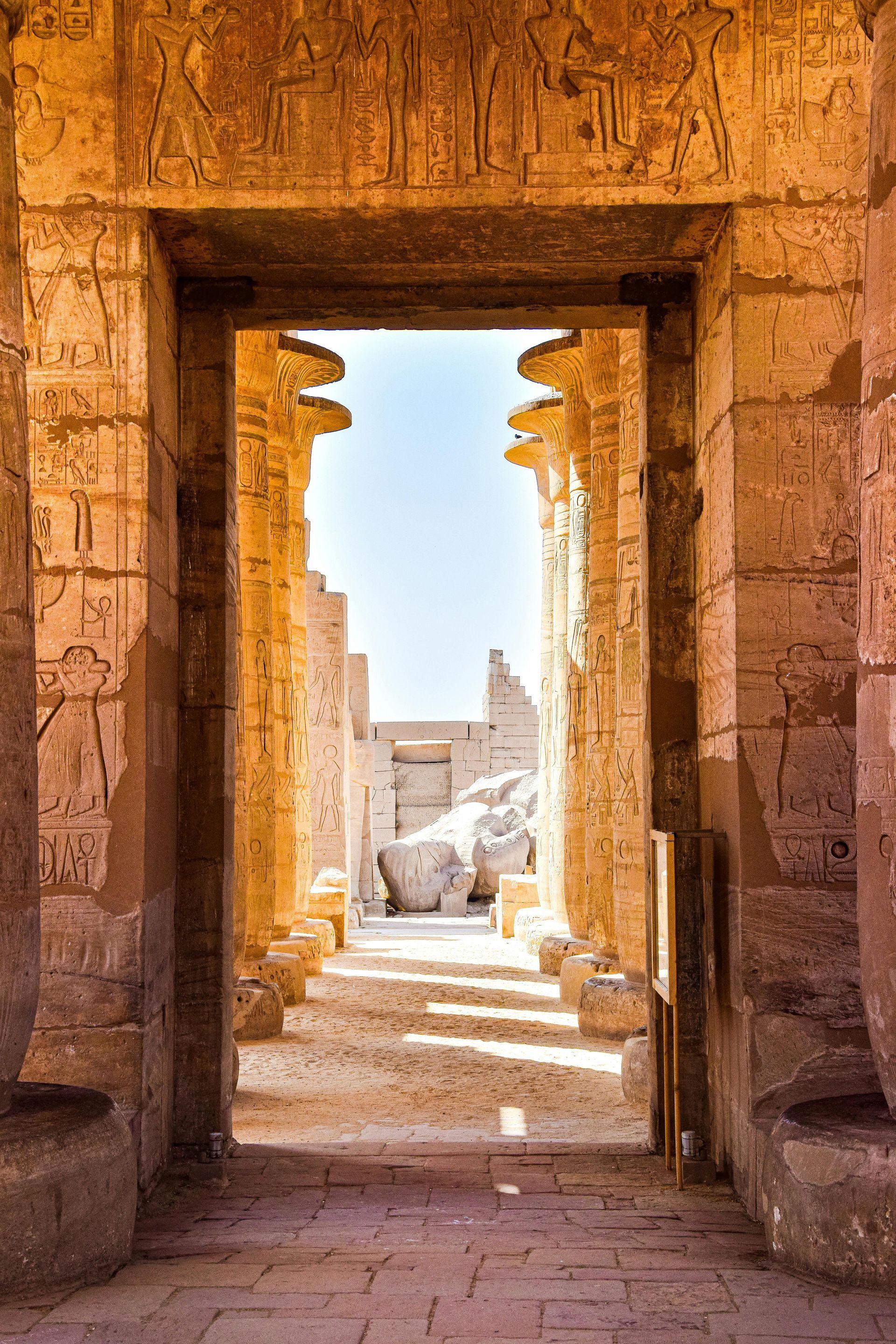 A view of an ancient building through a doorway in Egypt.