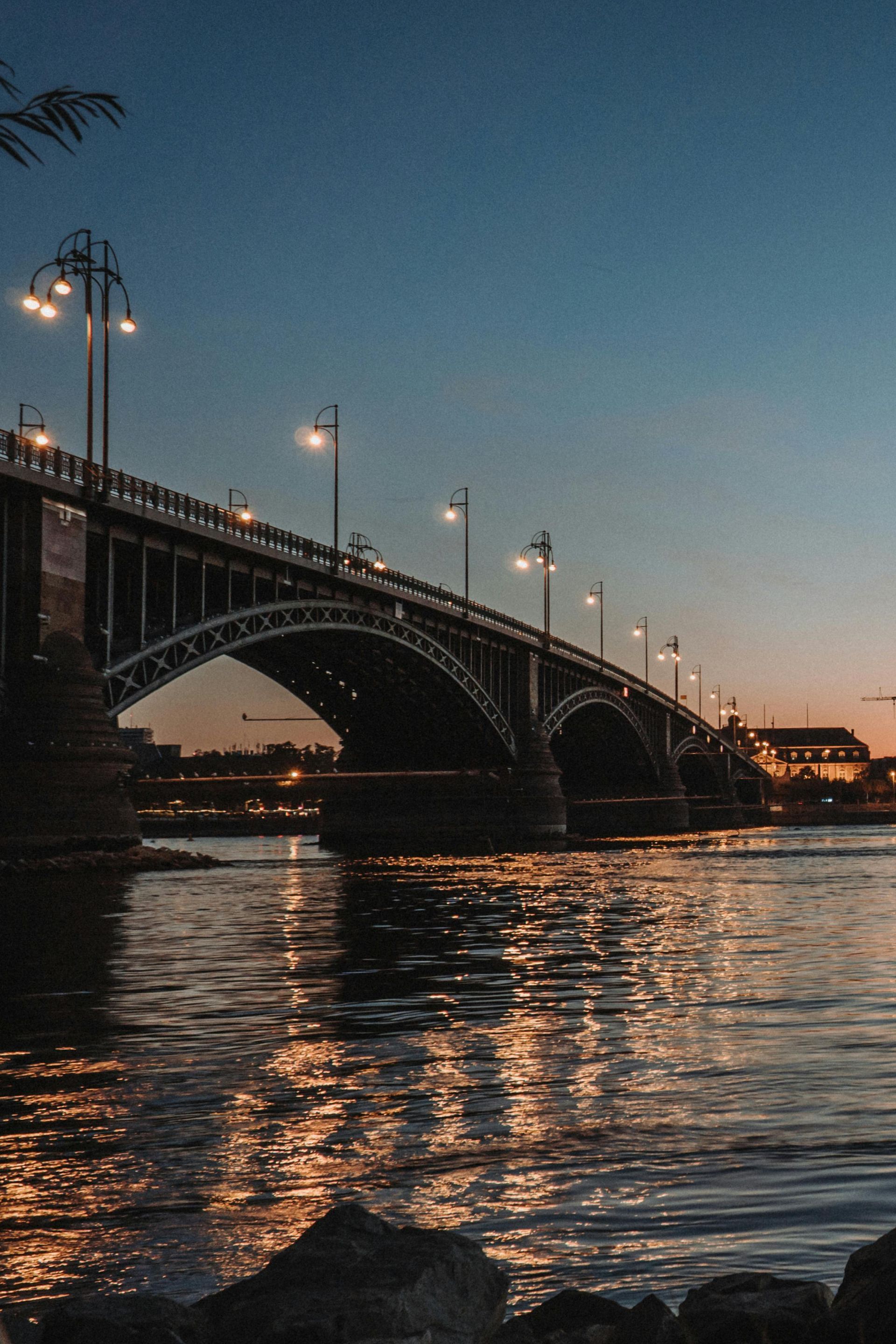 A bridge over The Rhine River at night