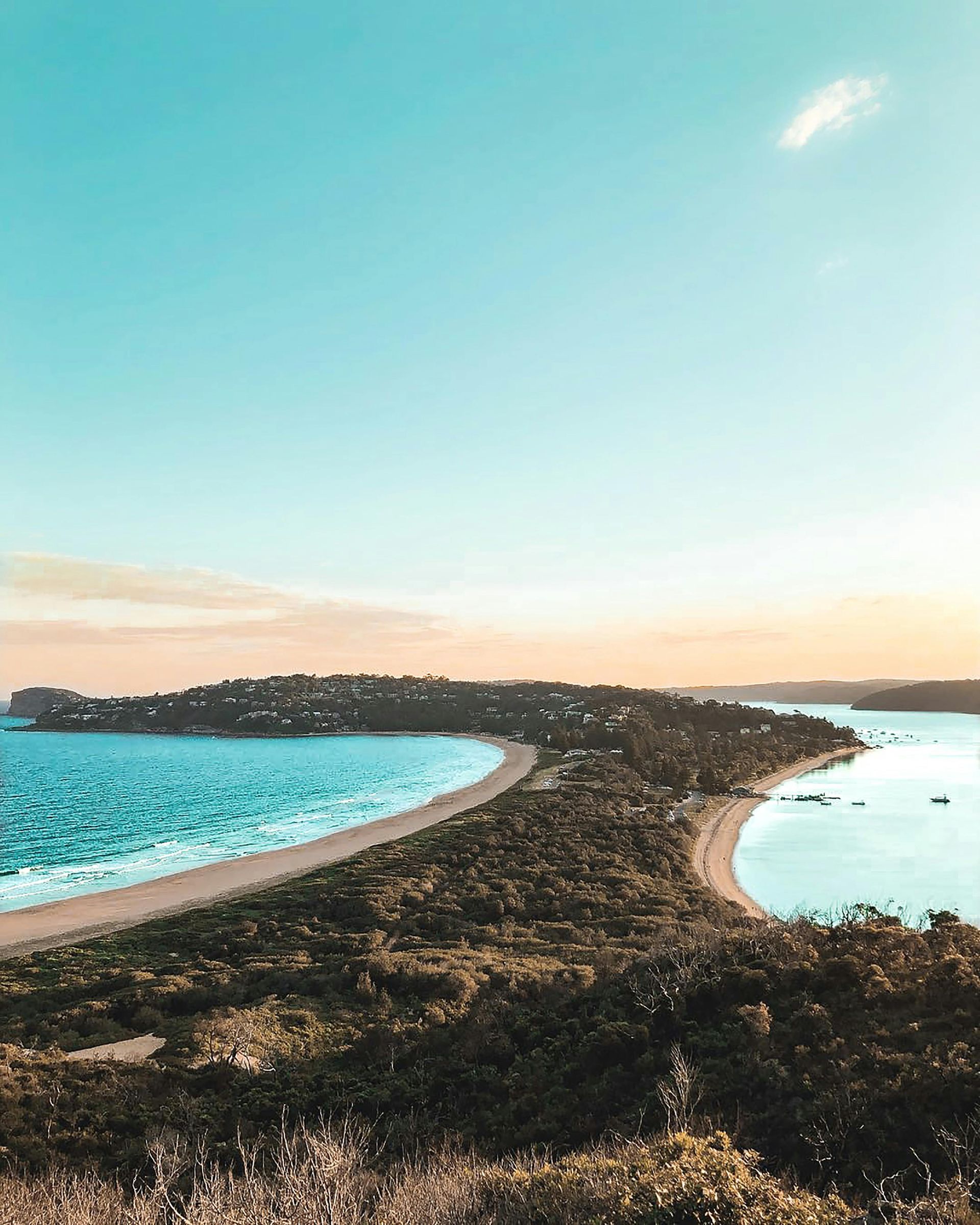 A view of a small island in the middle of a large body of water in Australia.