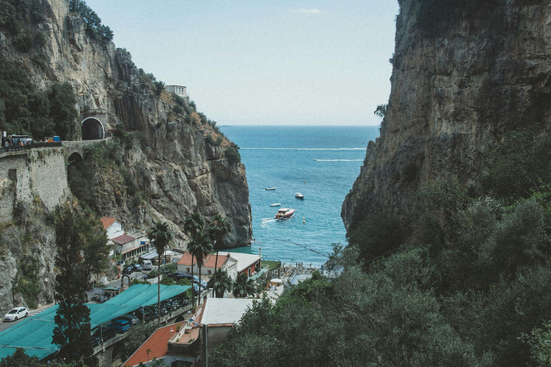 A view of the ocean from the side of a cliff in the Amalfi Coast, Italy.