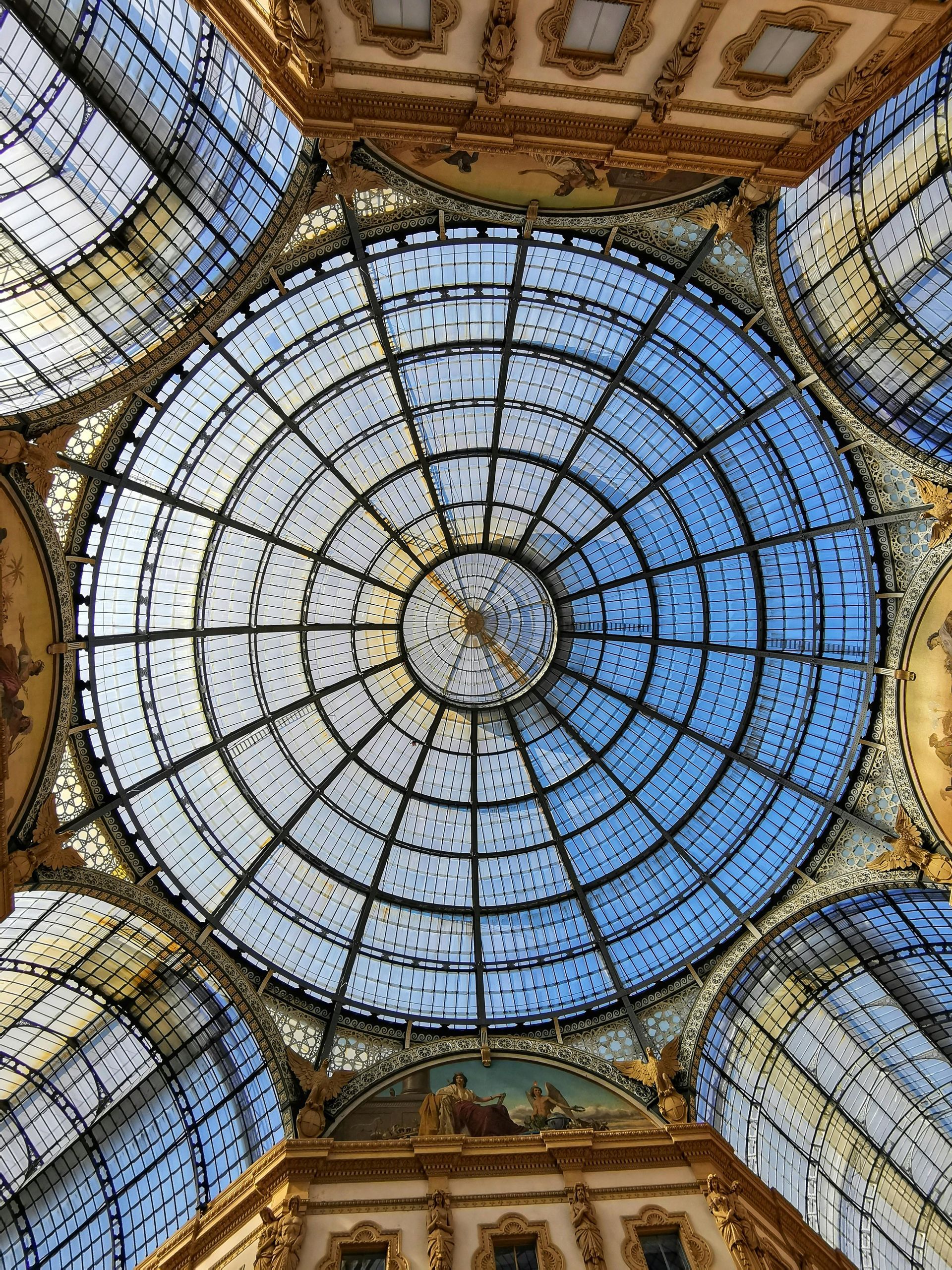 Looking up at the dome of Galleria Vittorio Emanuele II in Milan, Italy.