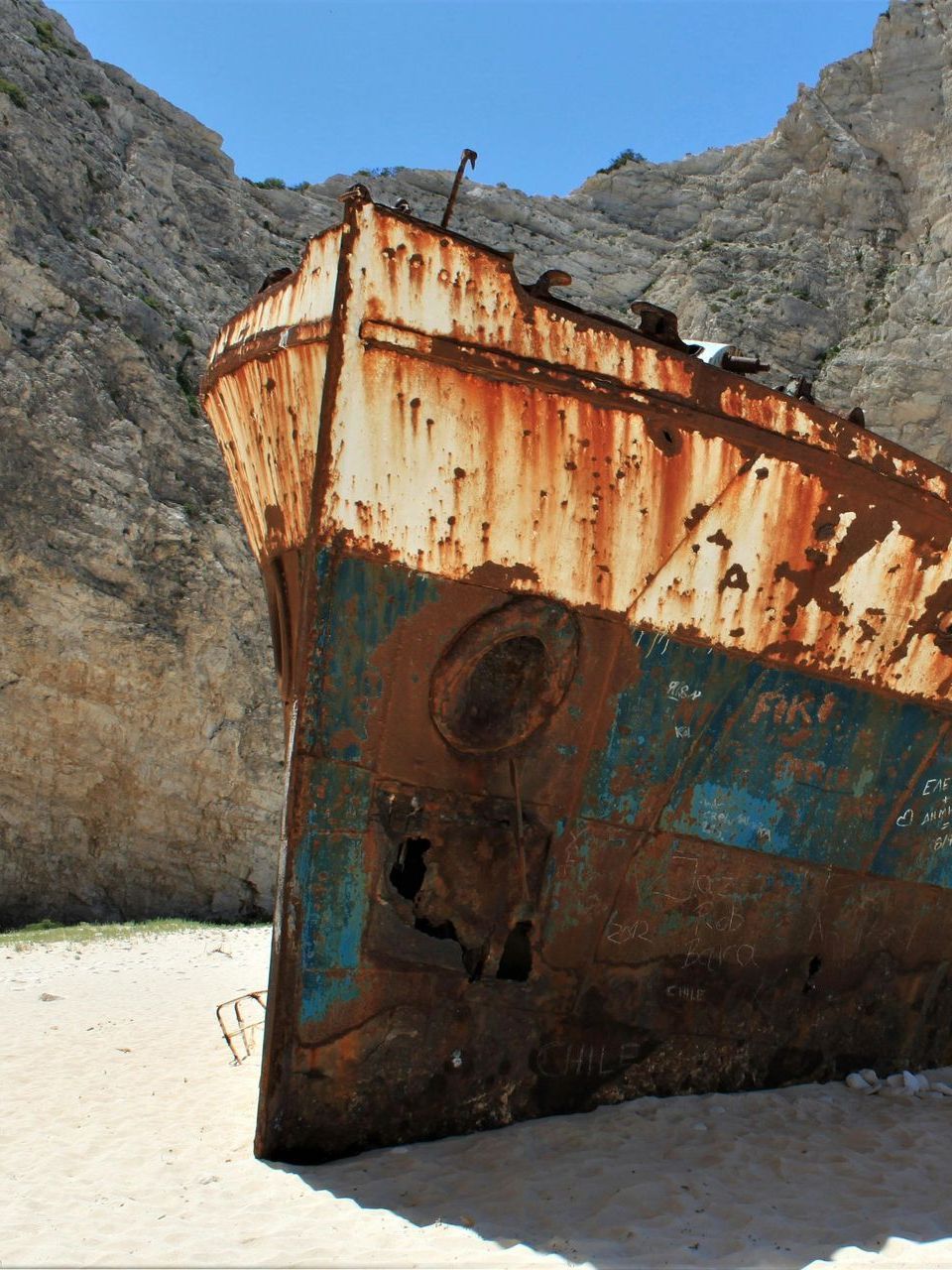 A rusty boat on Navagio Beach in Zakynthos, Greece.