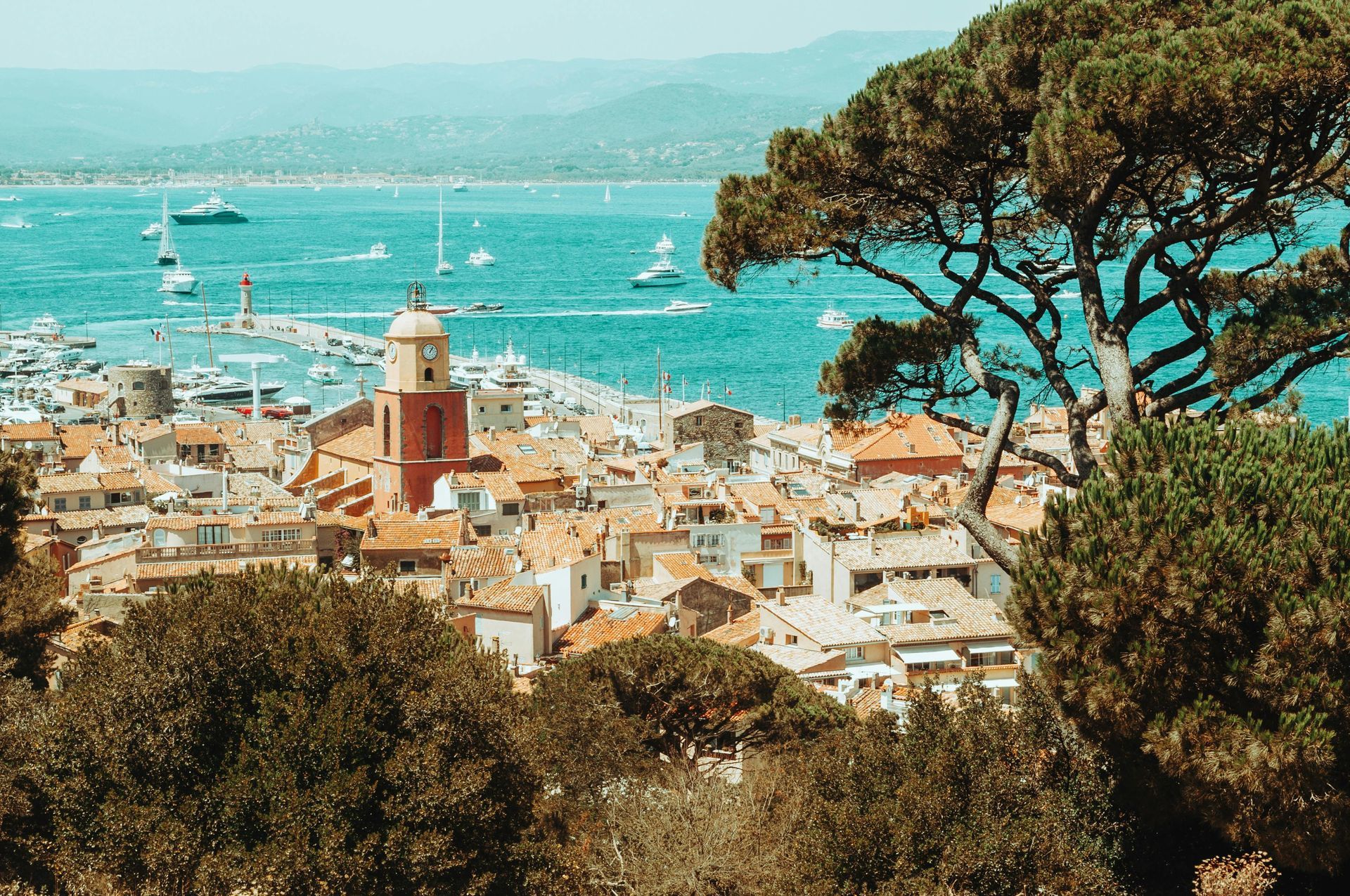 A view of a city from a hill overlooking the French riviera.