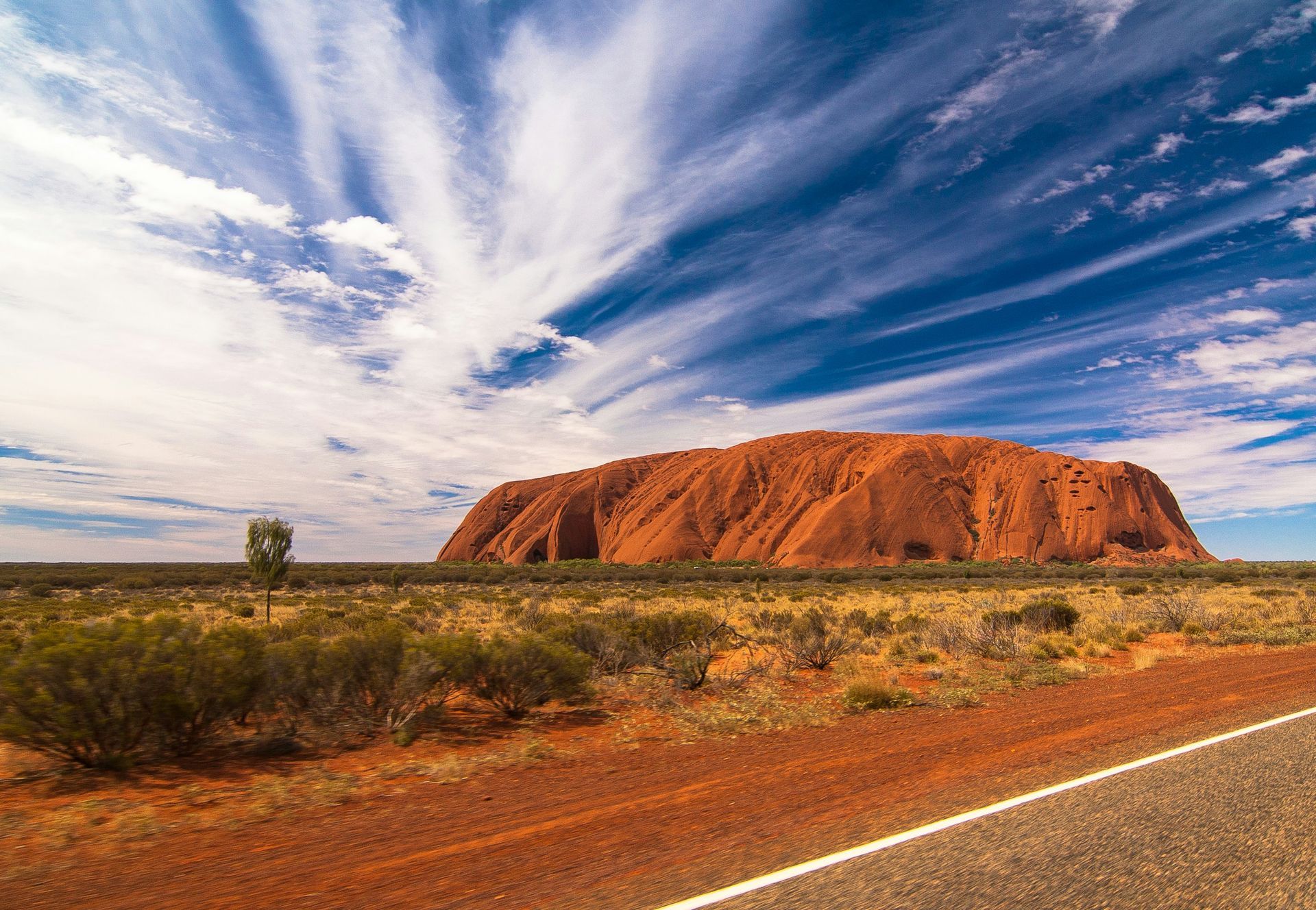 Uluru Rock in the middle of the desert in Australia.