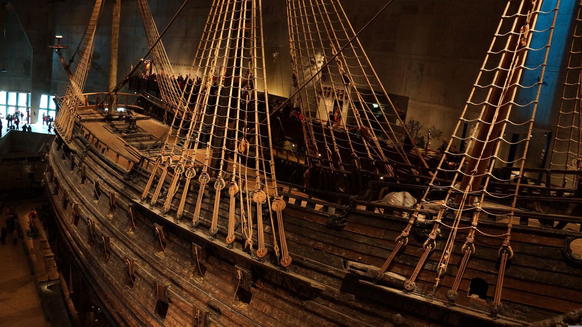 A large ship with a lot of ropes on it at the Vasa Museum in Stockholm.