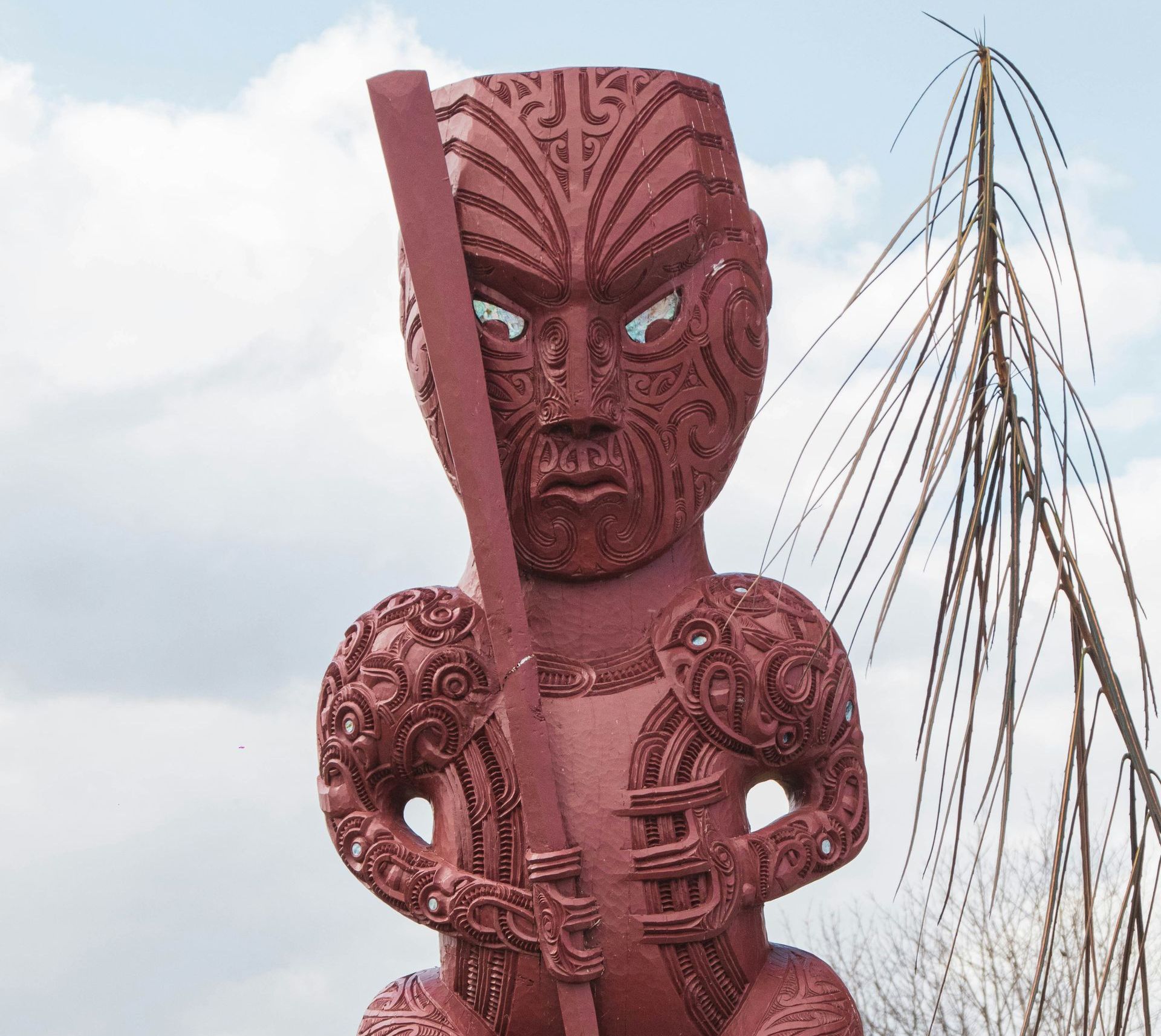 There is a Māori statue of a red man in New Zealand.