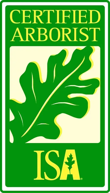 A green sign that says certified arborist isa