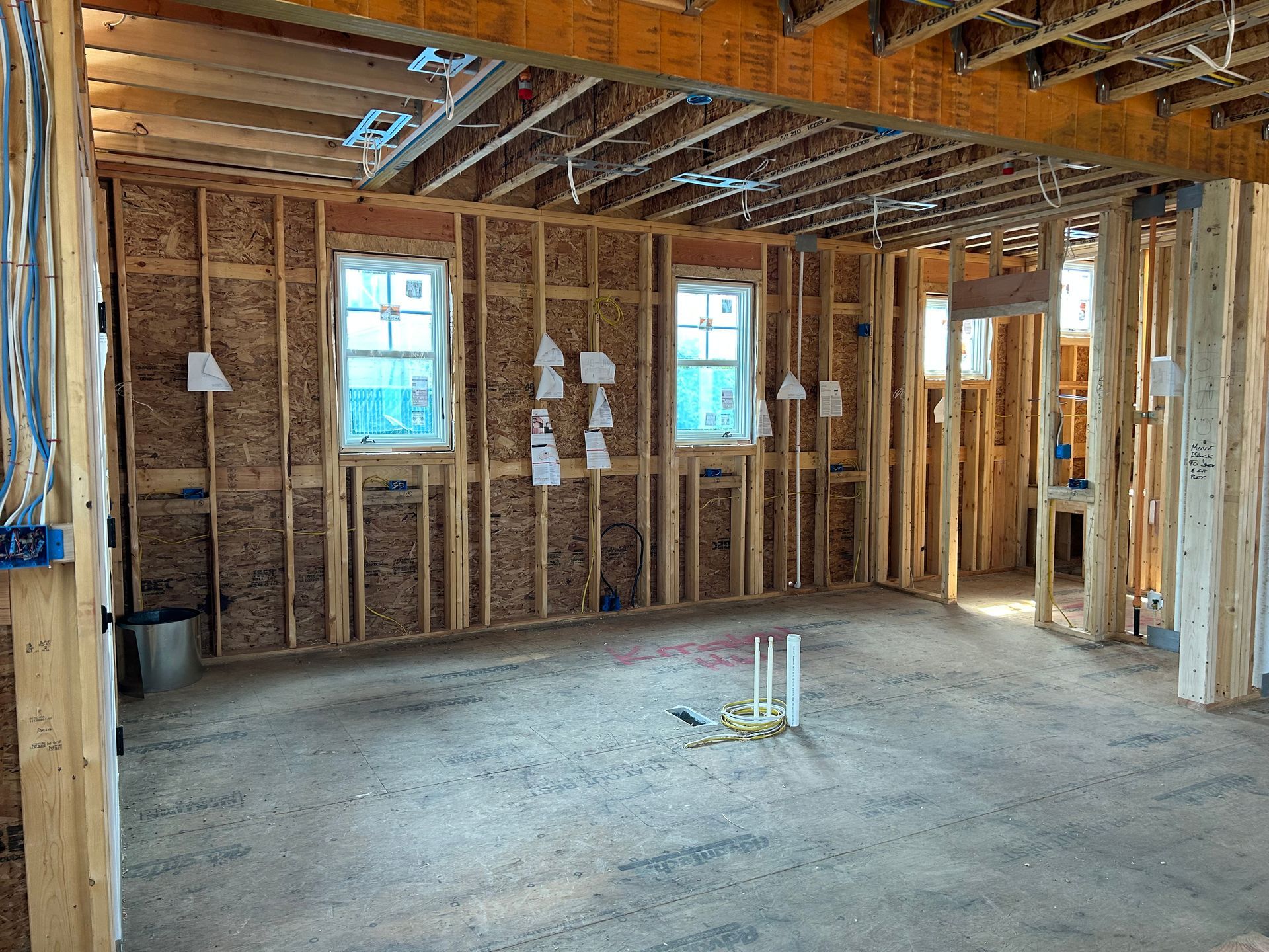 Luxury custom home framing showcasing precision craftsmanship and quality construction