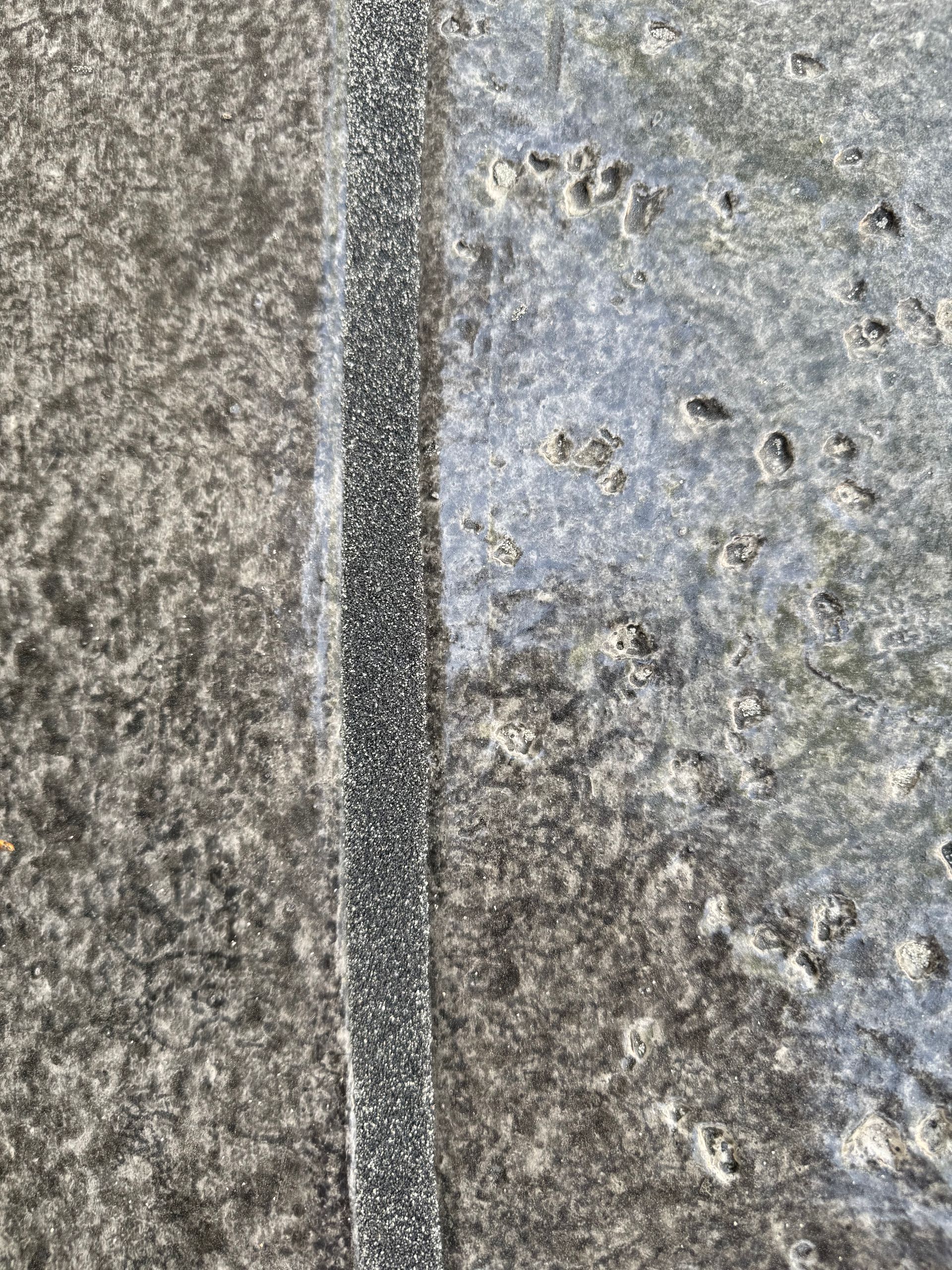 A close up of a newly sealed grout