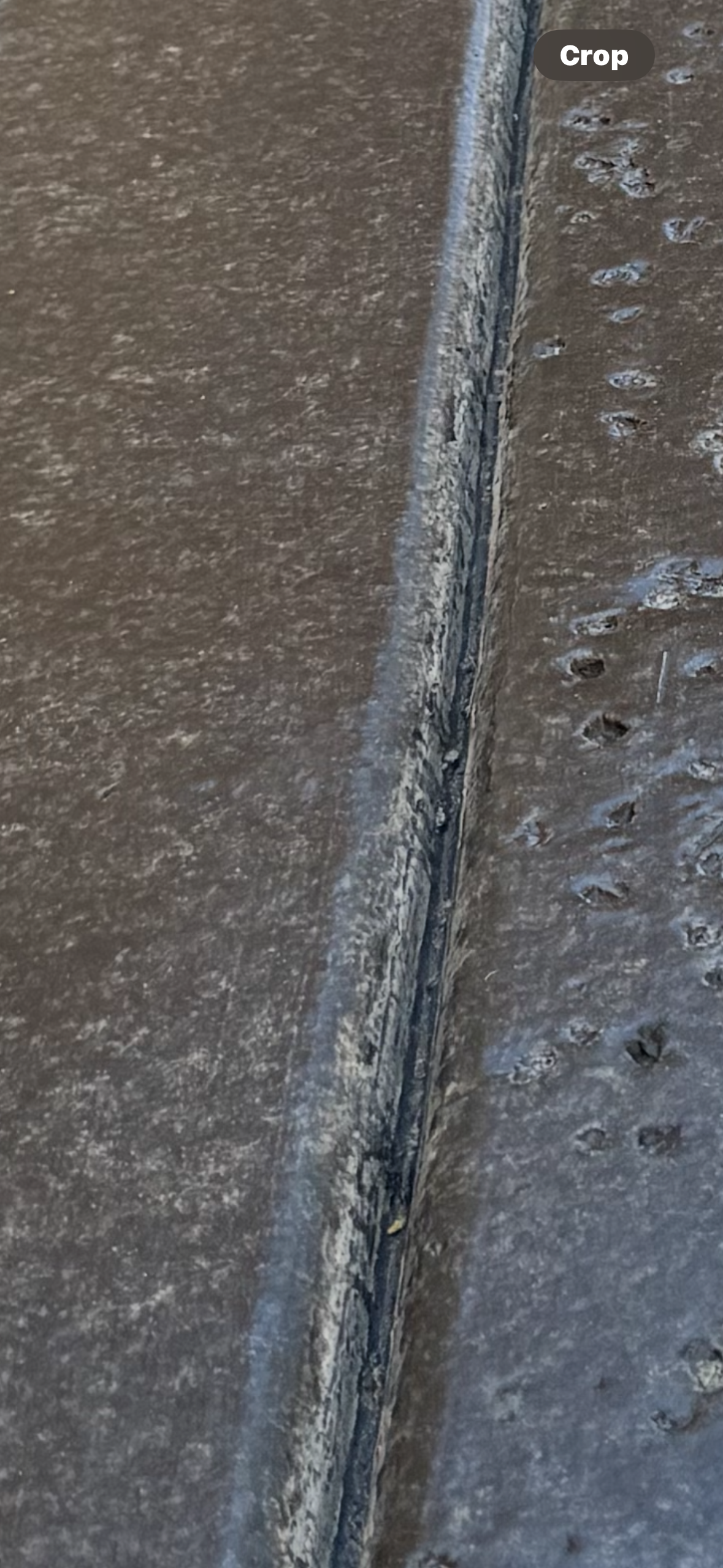 A close up of a dirty grout