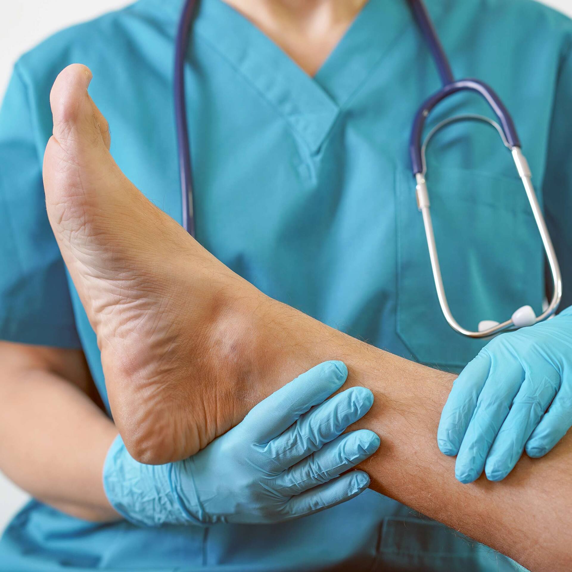 Hand of Doctor Holding Patient's Leg | Central Coast, Nsw | Angela Green Podiatry