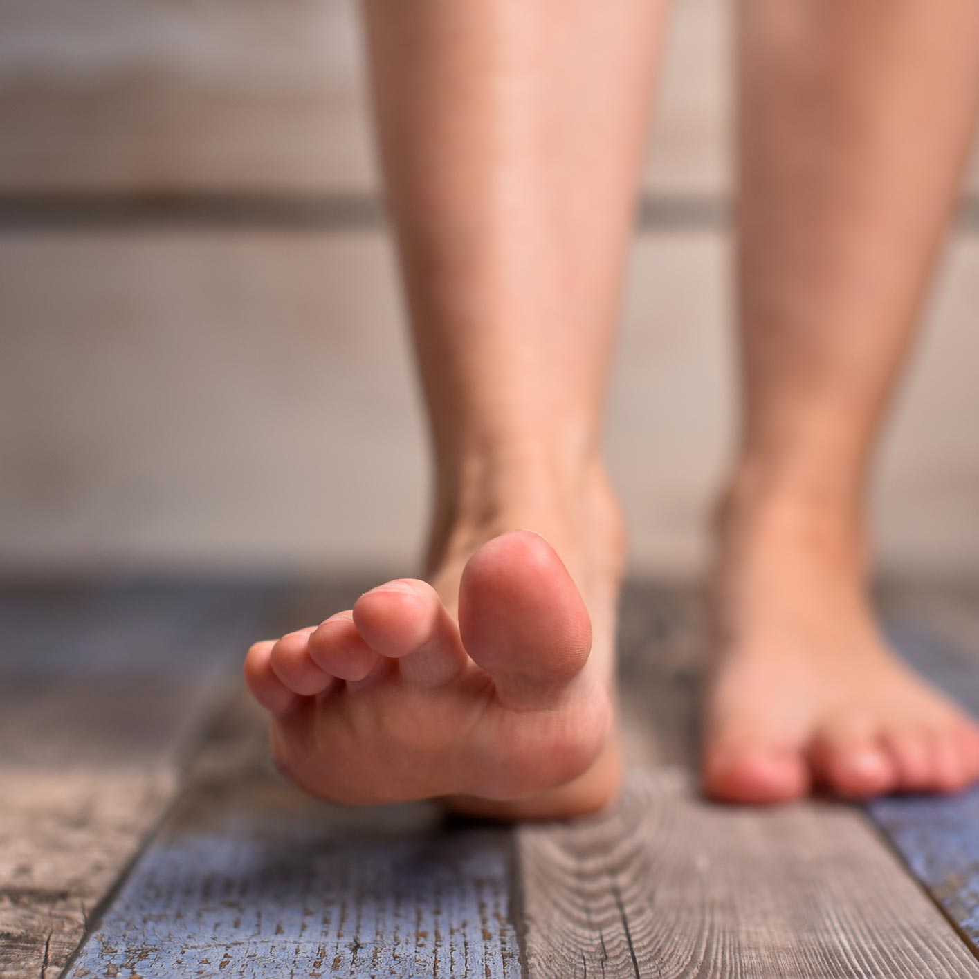 Barefoot Woman with Clean Feet Stepping on Floor | Central Coast, Nsw | Angela Green Podiatry