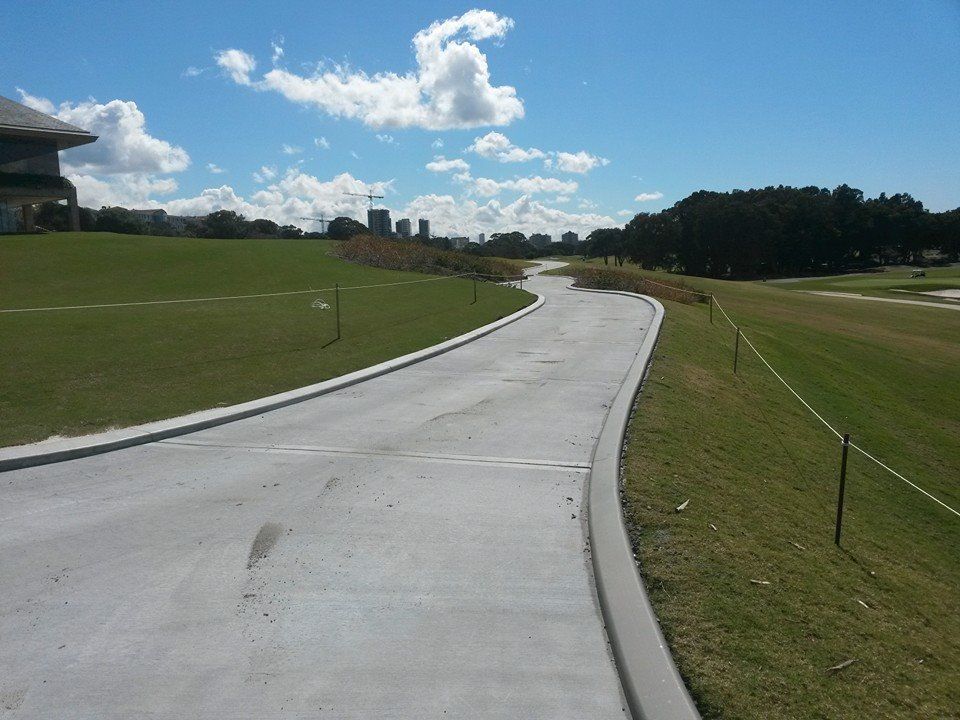 Concrete Walkway Leading to A Golf Course | Sydney, NSW | Kerbing Projects Australia