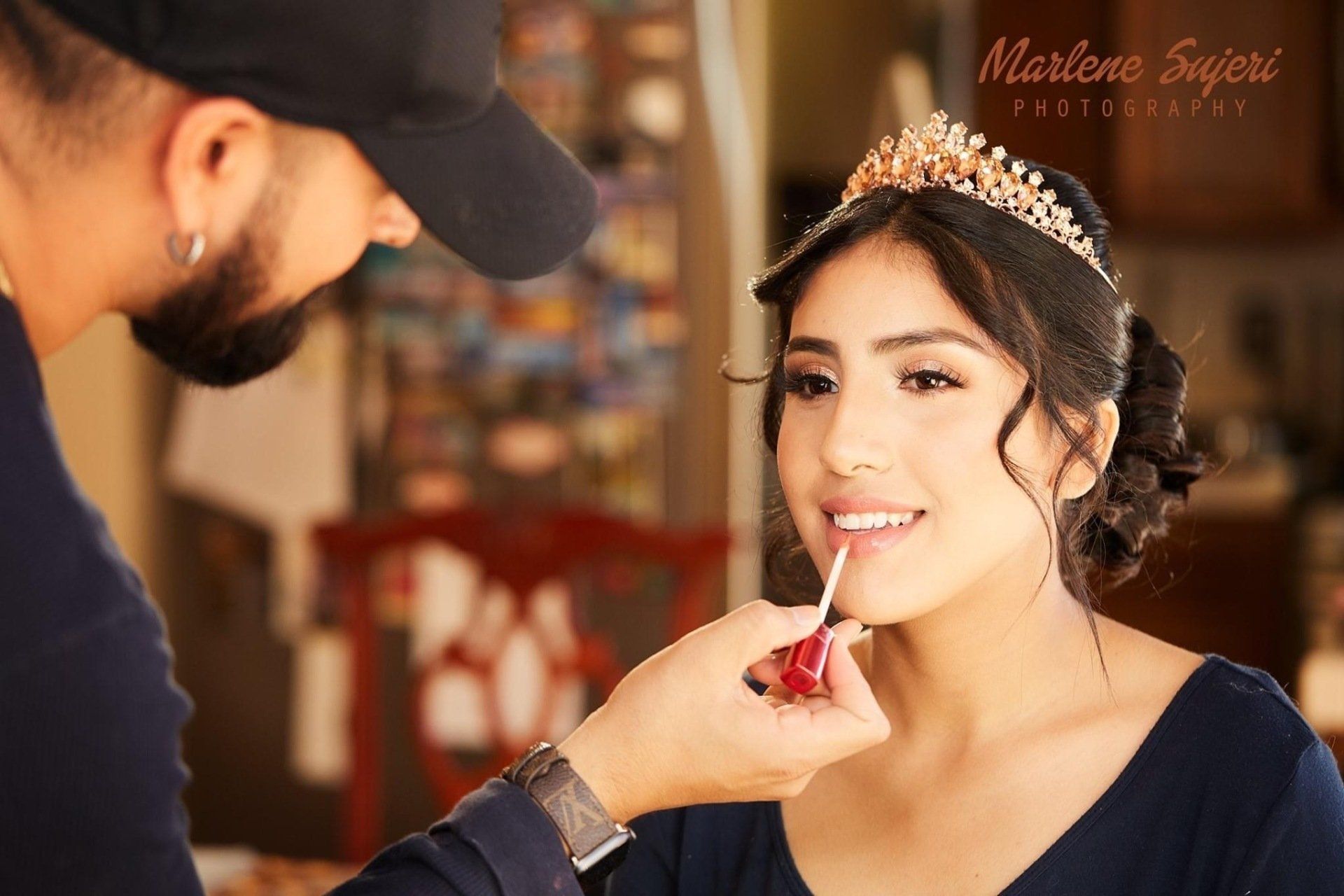 A bride and groom are holding hands while dancing at their wedding reception.