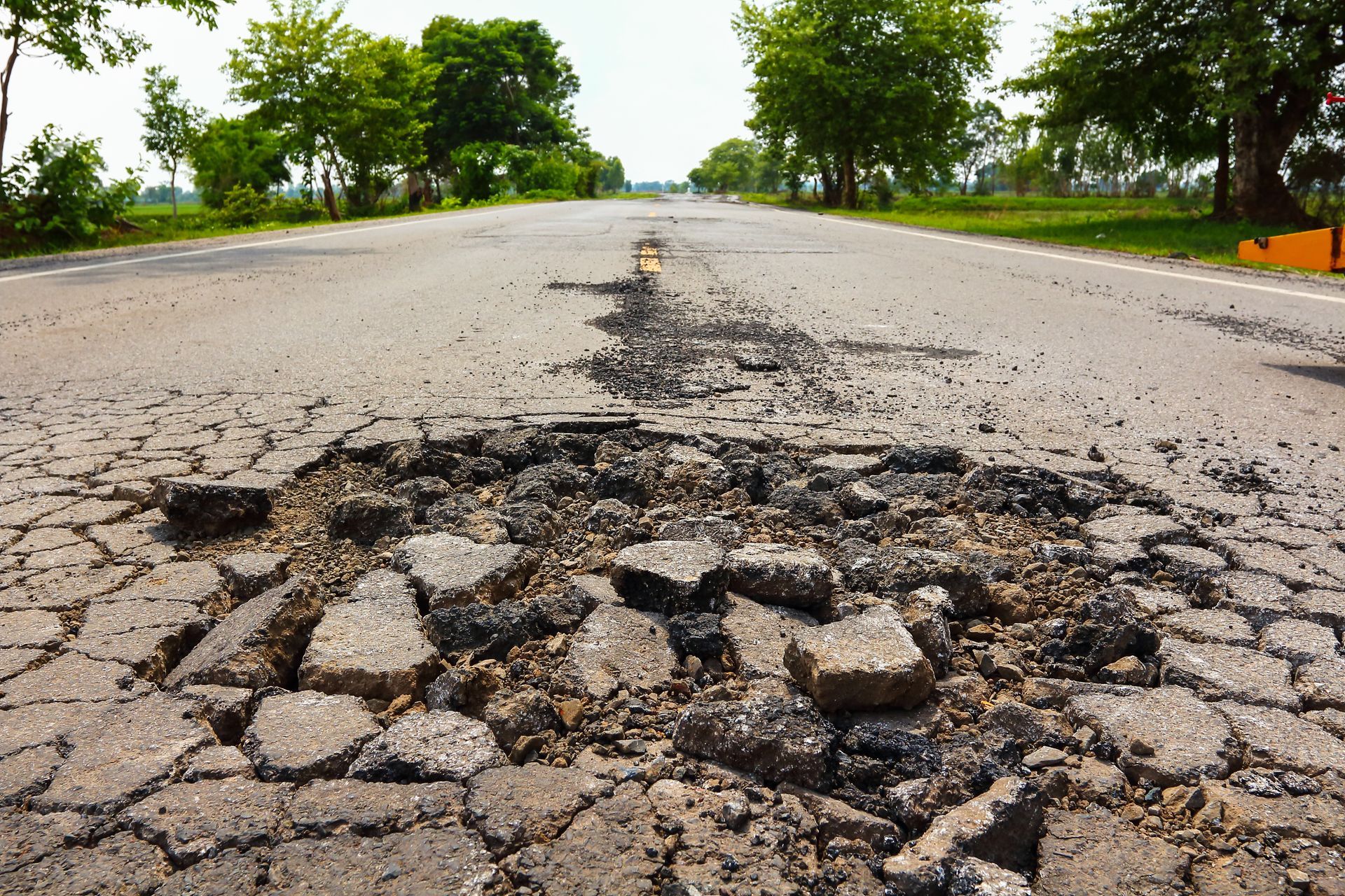 Cracked road | Military Brake & Alignment Services Inc.