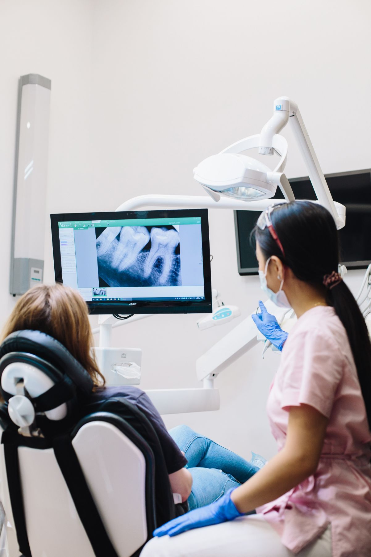Dentist Showing Teeth X-Ray — Dentistry Services in Cairns, QLD