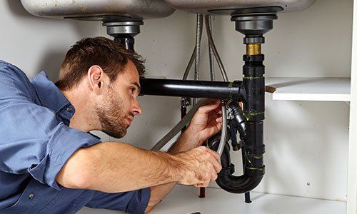Plumber Fixing Kitchen Sink — Taylor, TX — Rod Plumbing