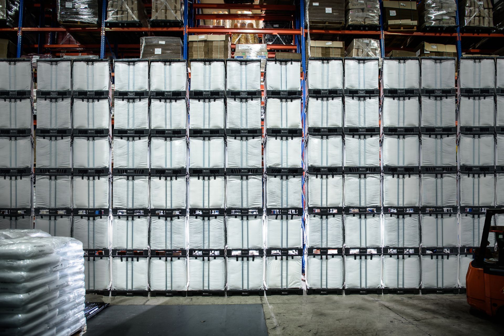Neatly stacked plastic bulk containers