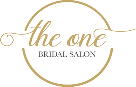 A gold circular logo that reads "the one" in elegant script over "BRIDAL SALON" in block lettering on a white background.